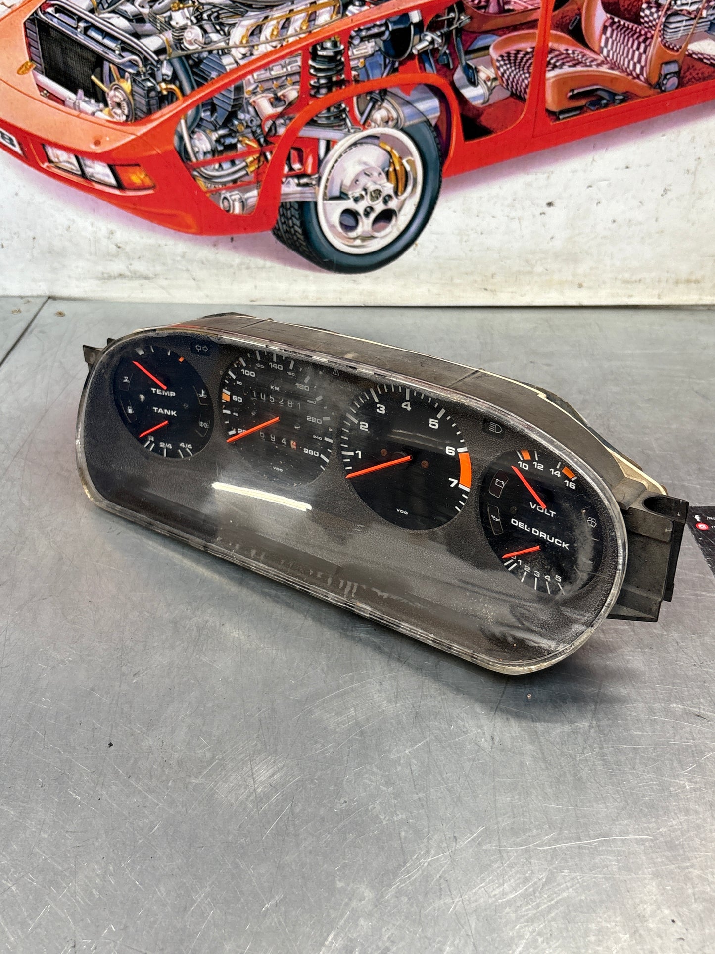 Porsche 928 dash clock binnacle pod speedometer, 92864110130 used showing 105281 Km, plastic screen has some scratches