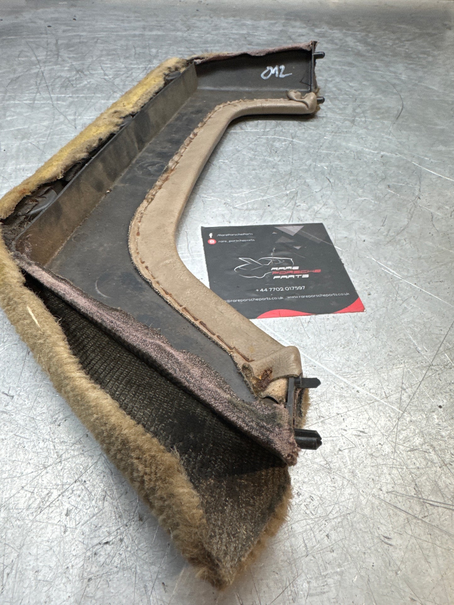 924/944 right, Passenger side beige carpeted door pocket, used 477867134