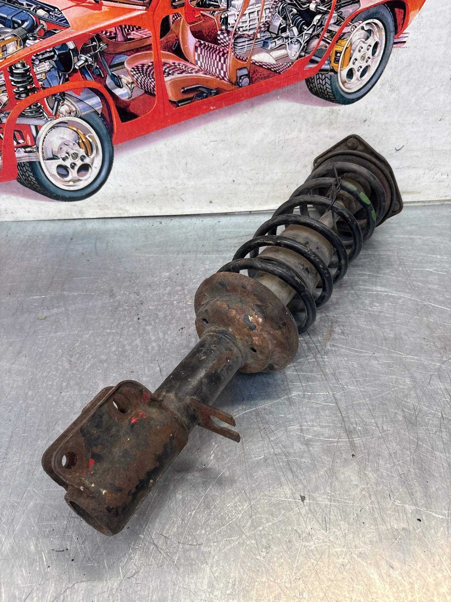 Porsche 944 in anticipo, gamba della sospensione sinistra 924S, usata, ricambio o riparazione