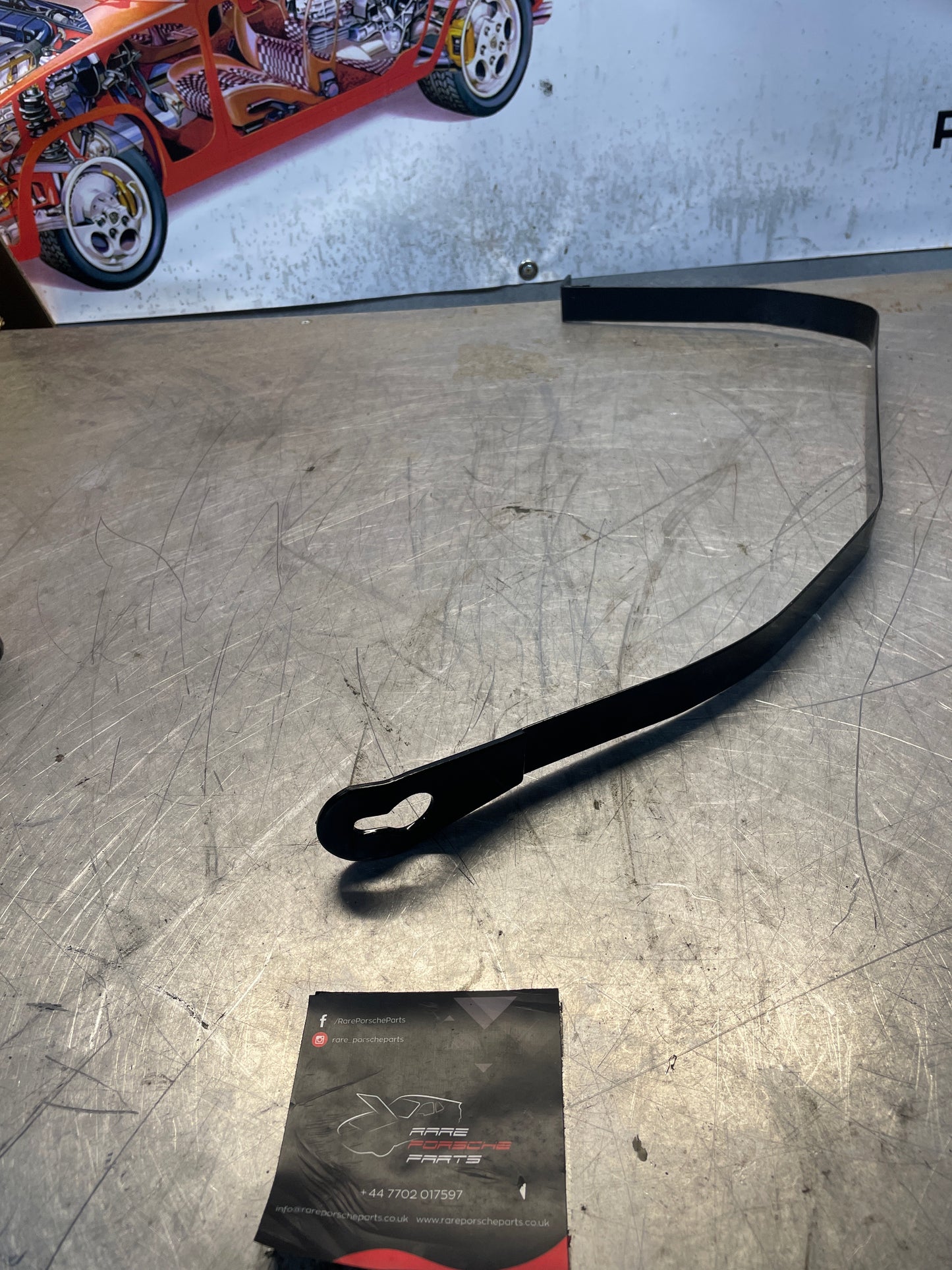 Porsche 944 90- fuel tank restraining strap, right used 95120131202, refurbished