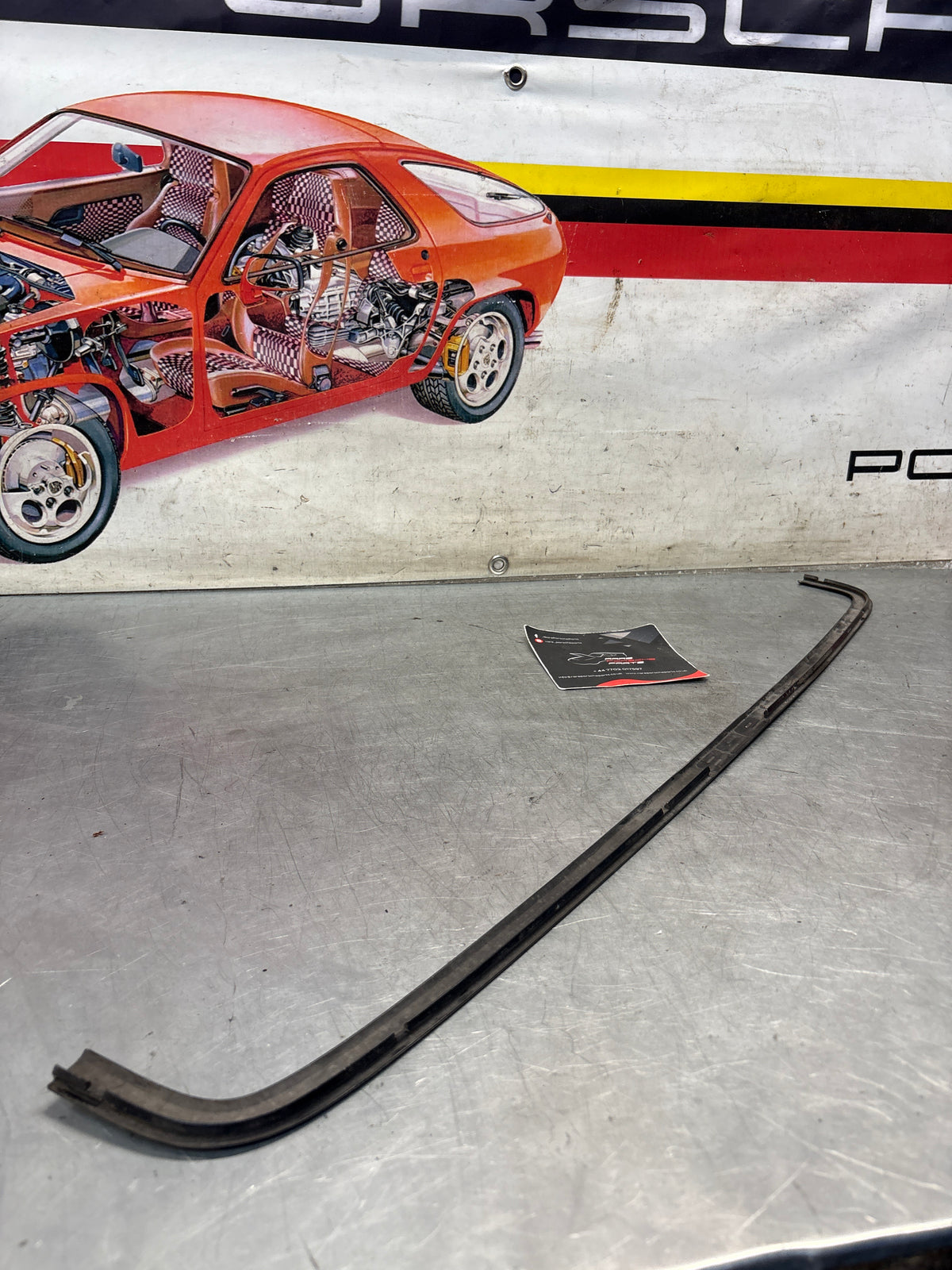 Porsche 928 rear window cover strip, used 92855915105