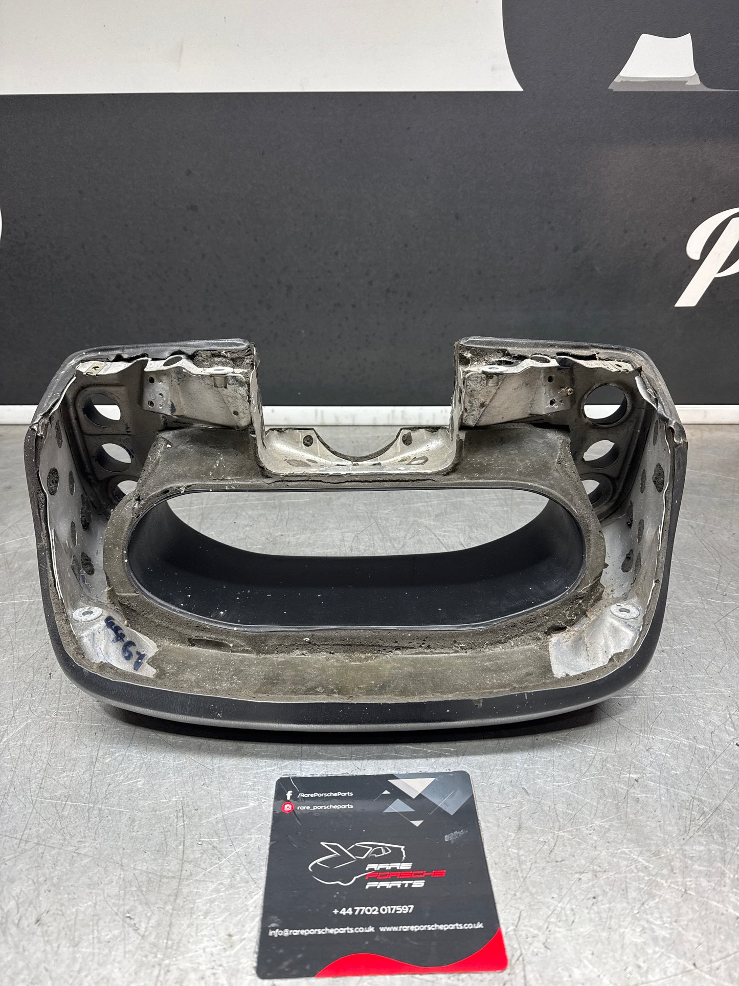 Porsche 928 speedometer cluster frame, 92855203102, black, used