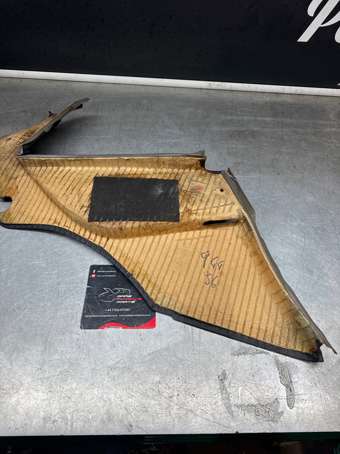 Porsche 944 right Rear Quarter Trim Card, black - used 94455502209