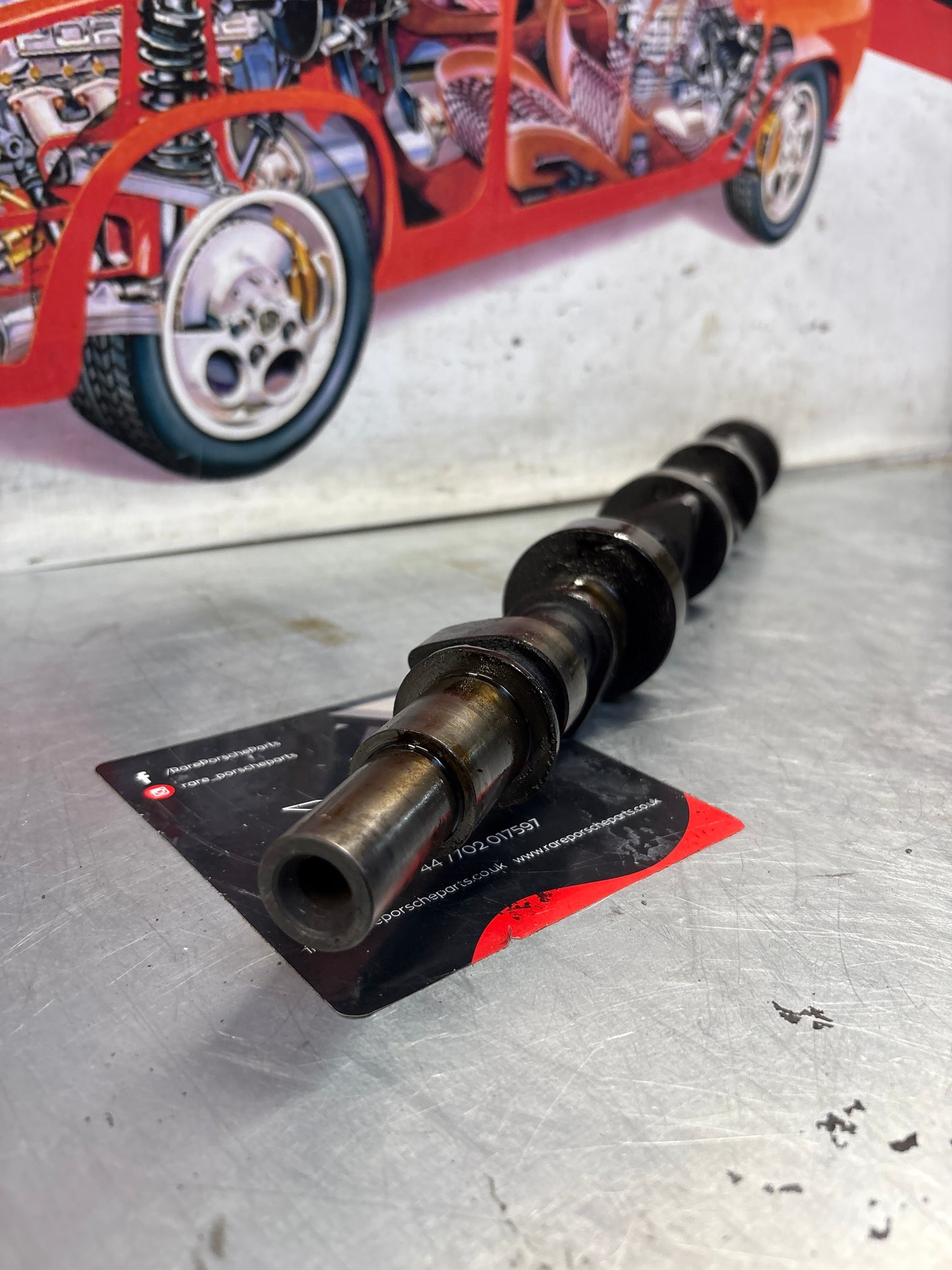 Porsche 928 cam shaft, used 9281051870R