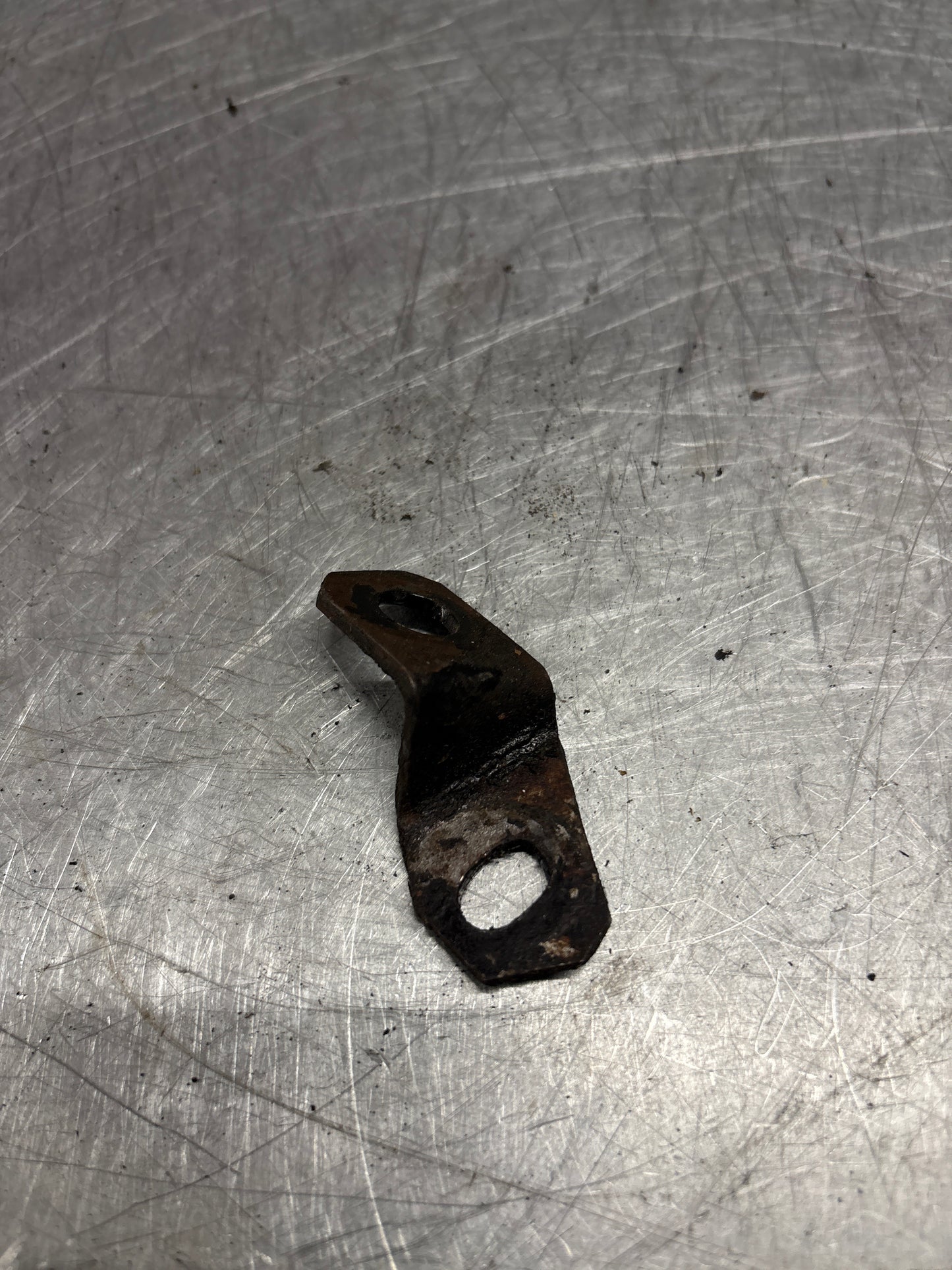 Porsche 944 exhaust manifold bracket, used 94411016501