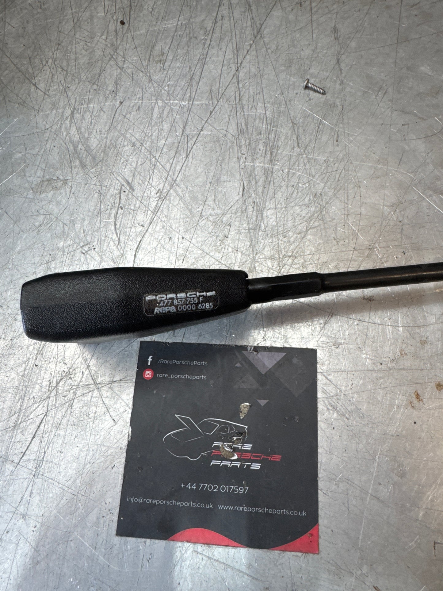 Porsche 924 early left seat belt anchor clasp retainer, buckle. 477857755D NOS