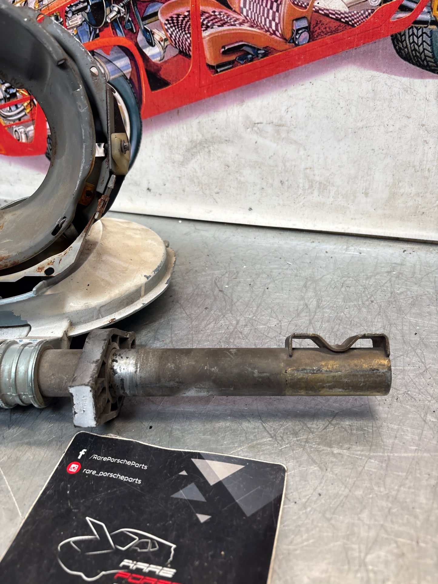 Porsche 928 left headlight swivel frame 92875024902 92875024302 used