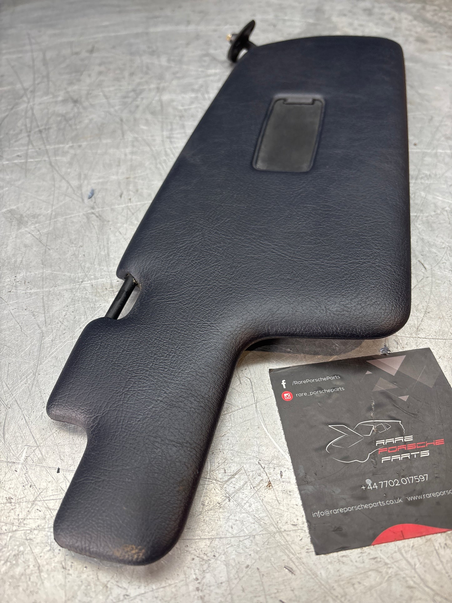 Porsche 944 right O/S sun visor in cobalt blue, used for late cars 94473103201