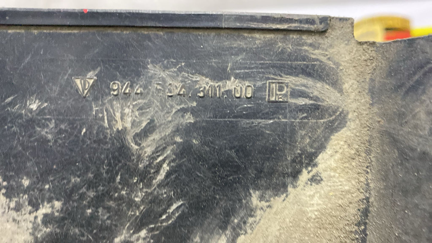 Porsche 944 Wheel housing lining 94450431100 used, damaged