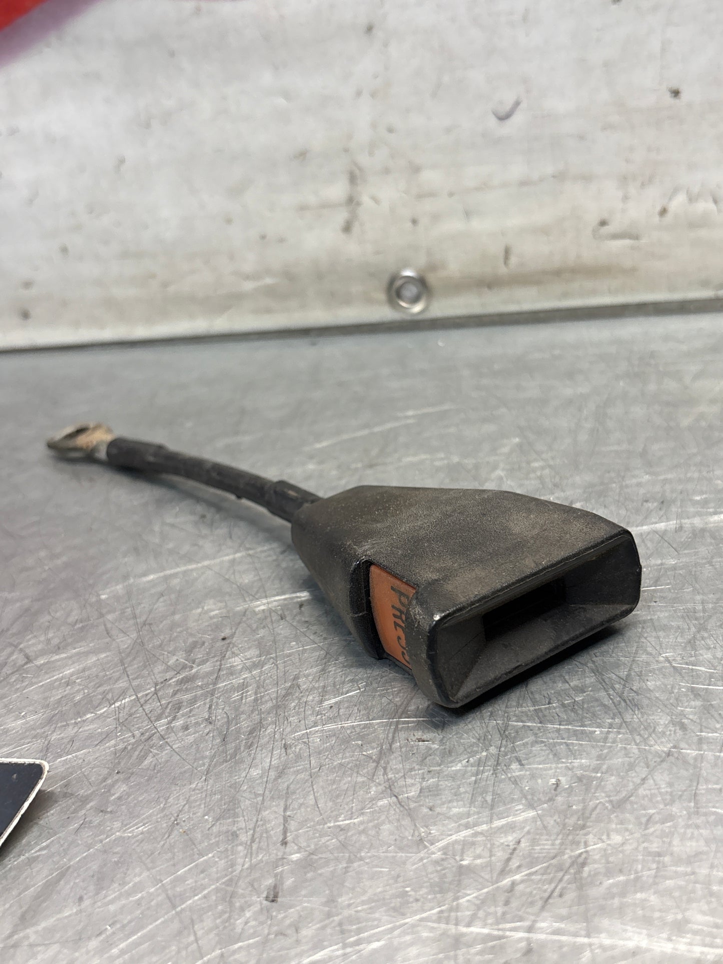 Used Porsche 924 early right seat belt anchor clasp retainer, buckle. 477857756D used