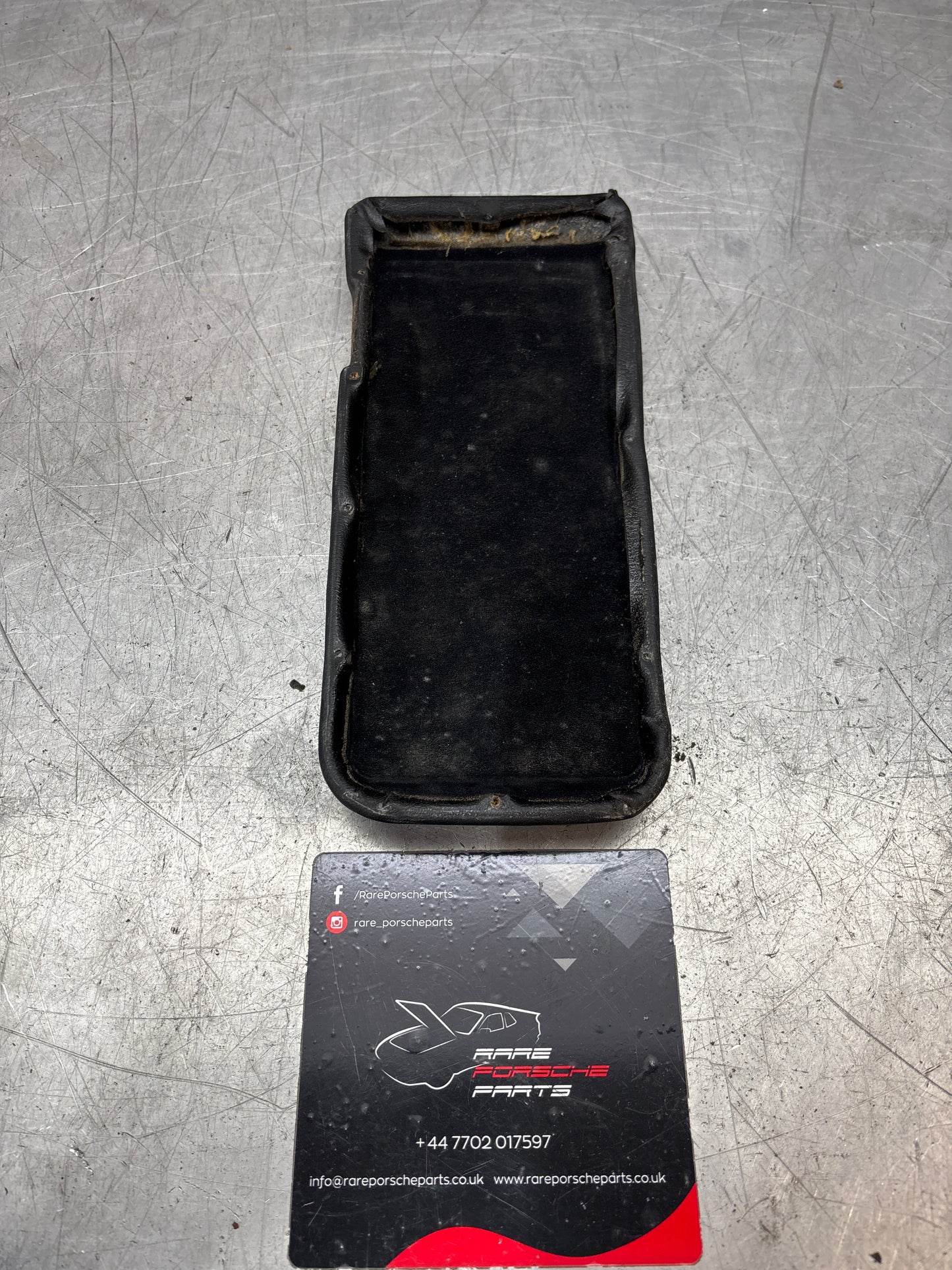Porsche 944 86-92 arm rest top black 94555206300 used RHD, faded