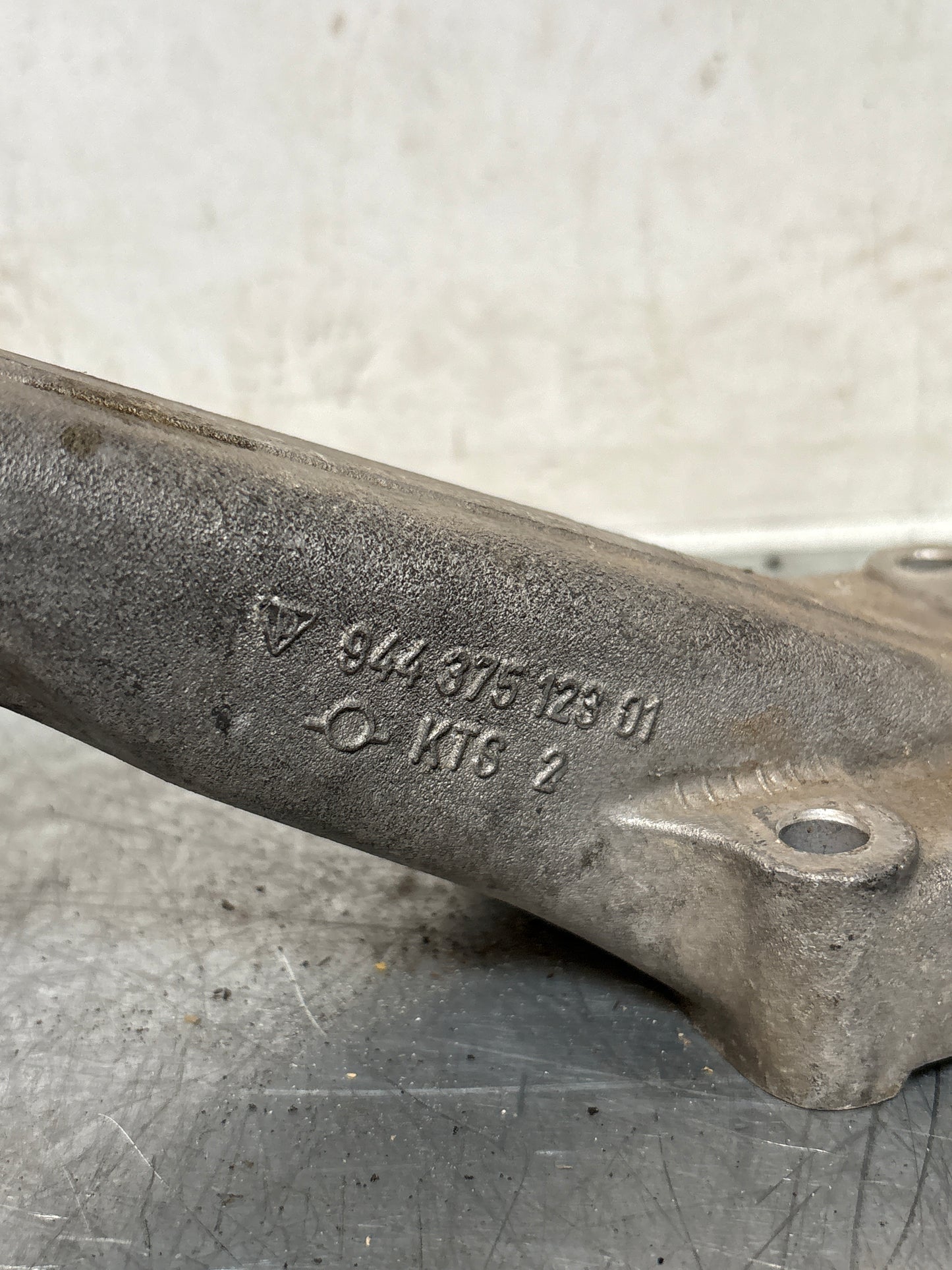 Porsche 944 engine carrier bracket, used 94437512301