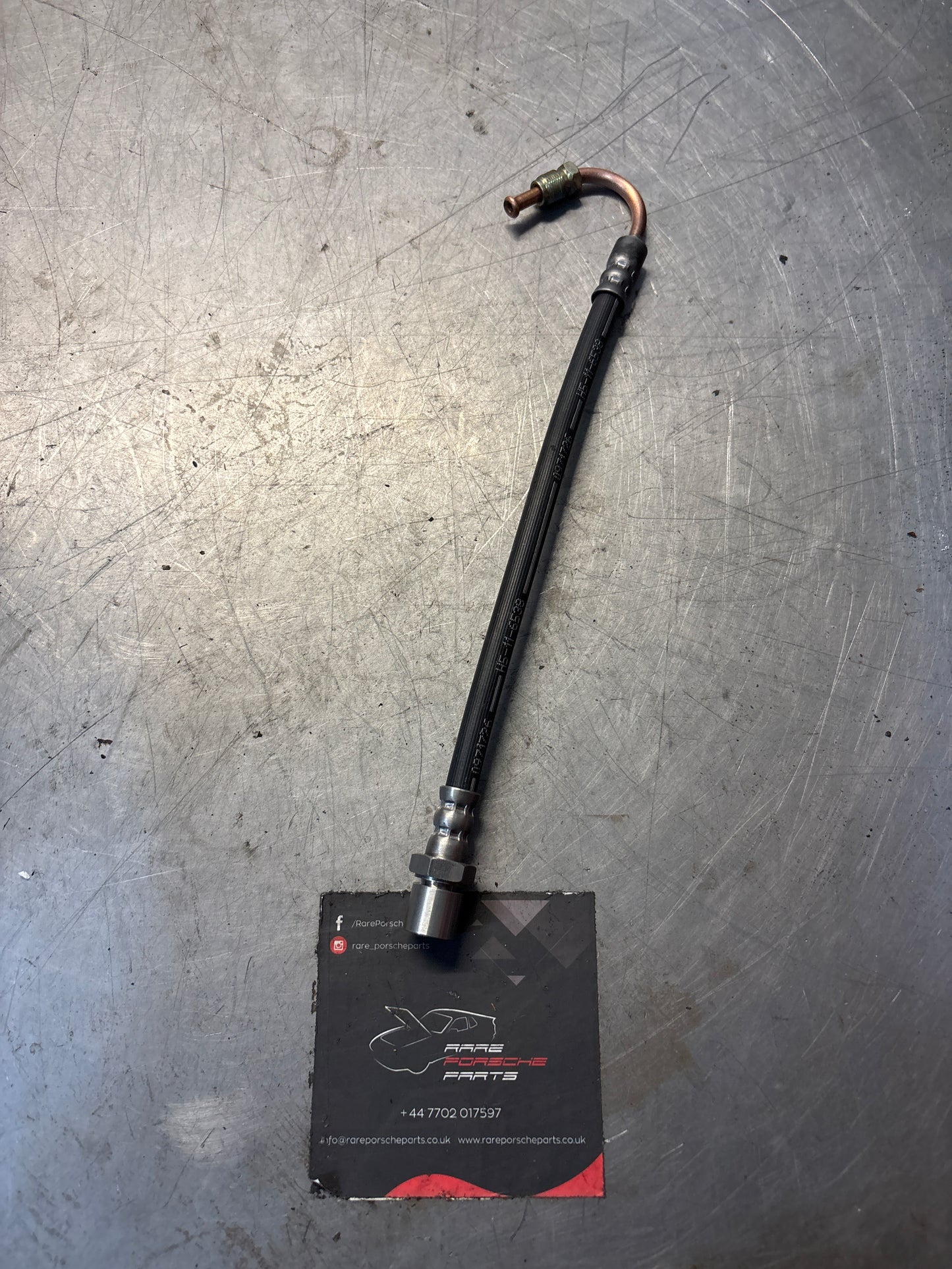 New Porsche 944 S2 clutch flexi hose - 94542308911 for RHD cars, refurbished