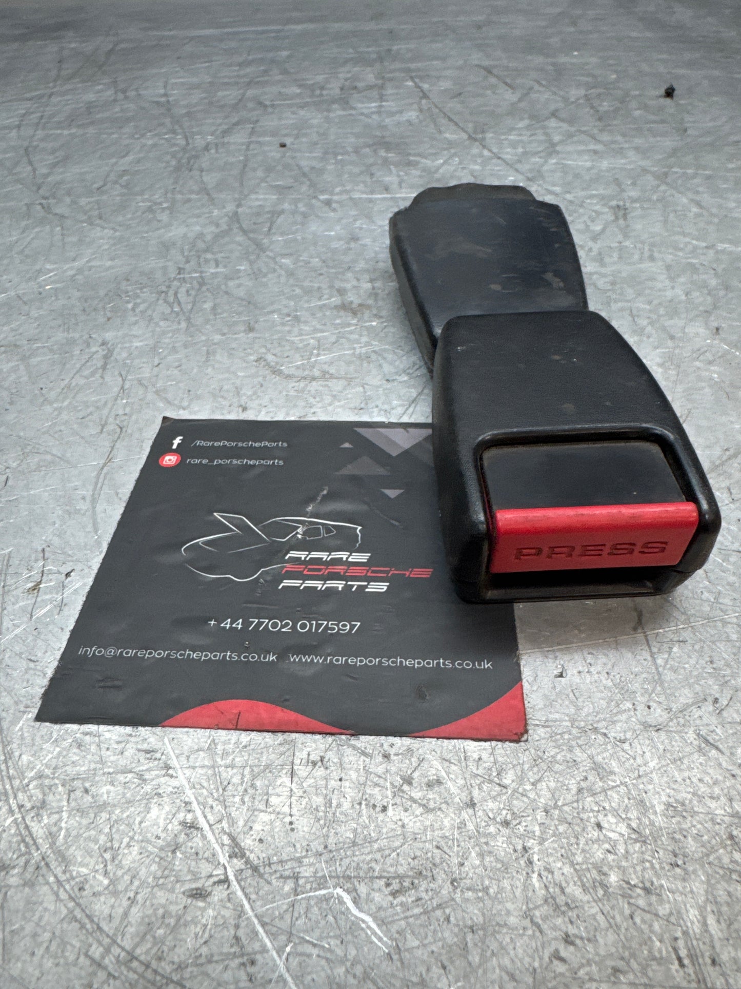 Porsche 924 944 rear seat belt clasp buckle retainer 477857739B used