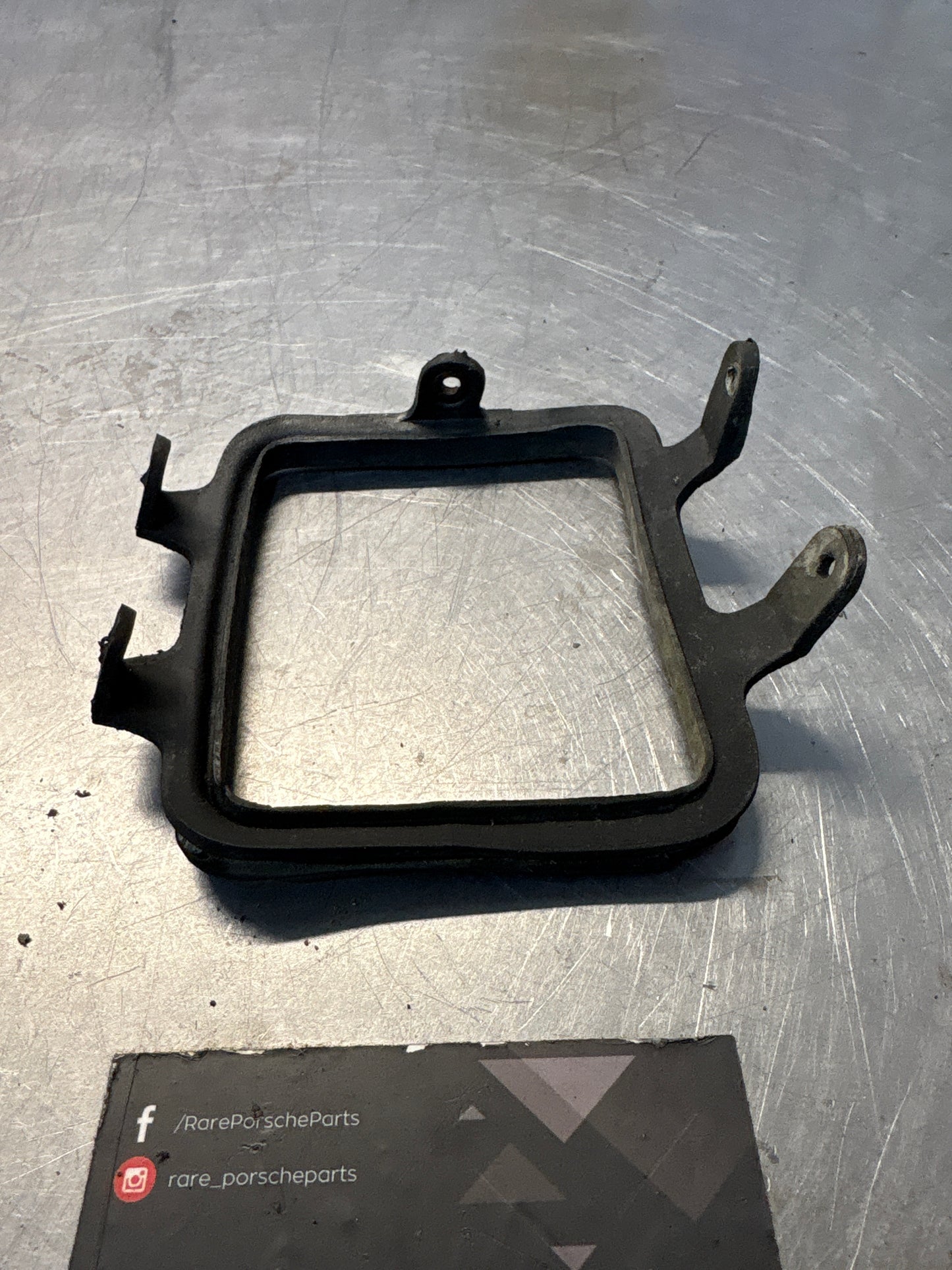 Porsche 928 rear fog light frame, left, used 92850528602