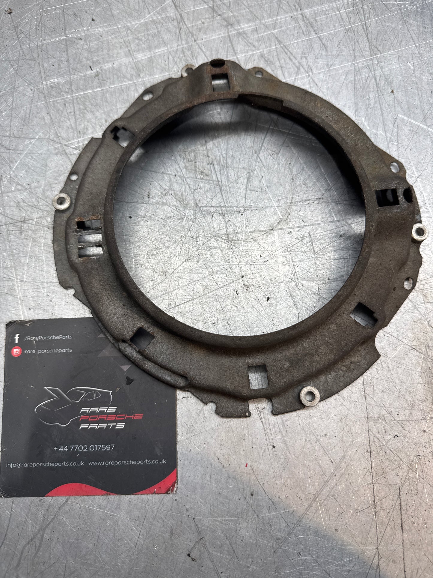 Porsche 924 944 headlight retaining frame, used
477941046