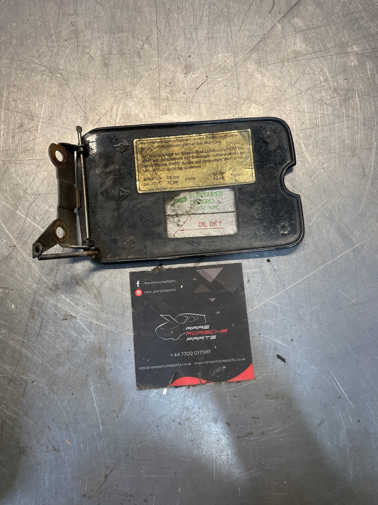Porsche 928 Fuel filler flap, used 92850430102