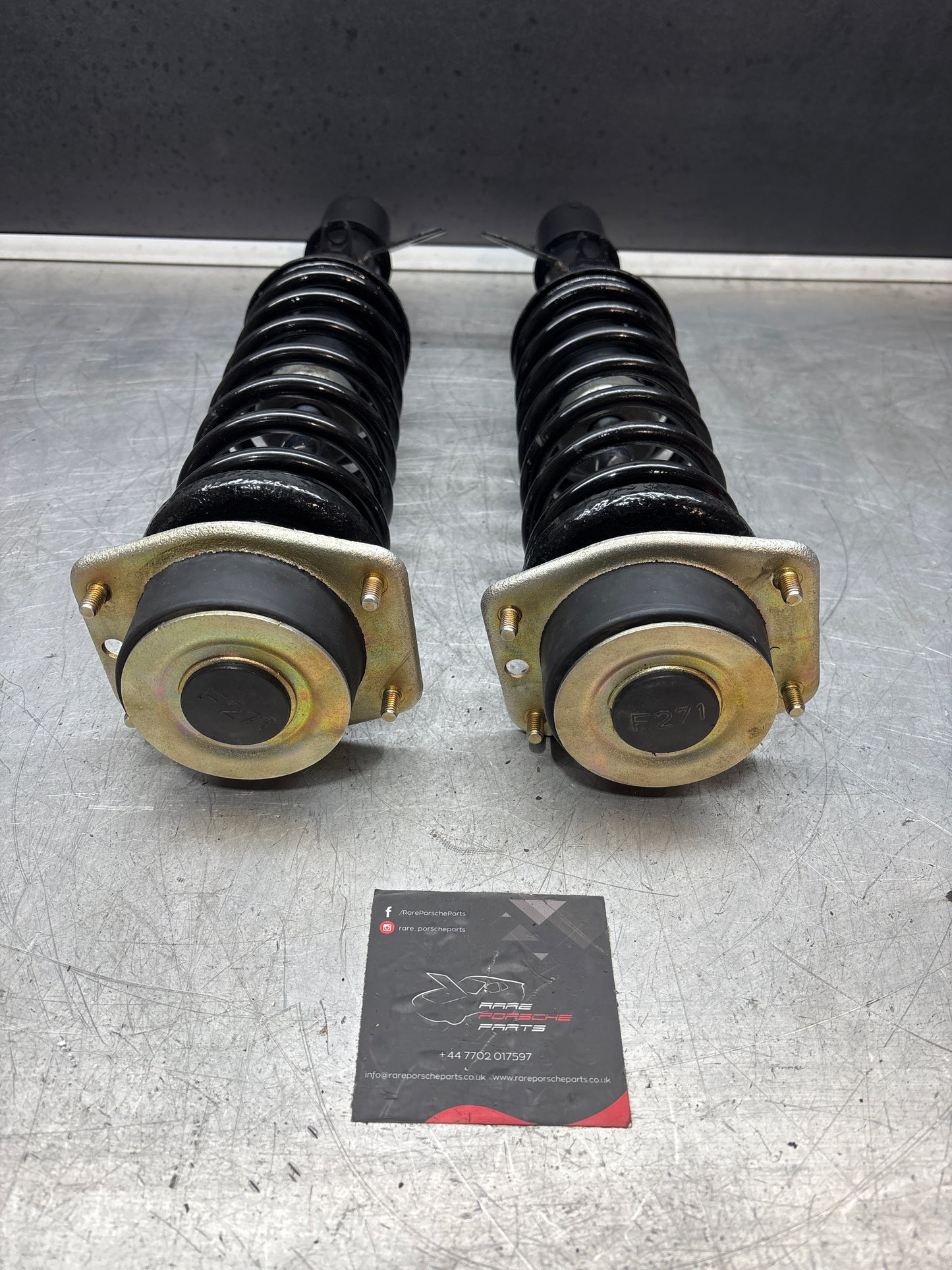 Porsche 944 S2 pair of refurbished suspension leg with spring and top mount bearing 94434303119 / 94434303219