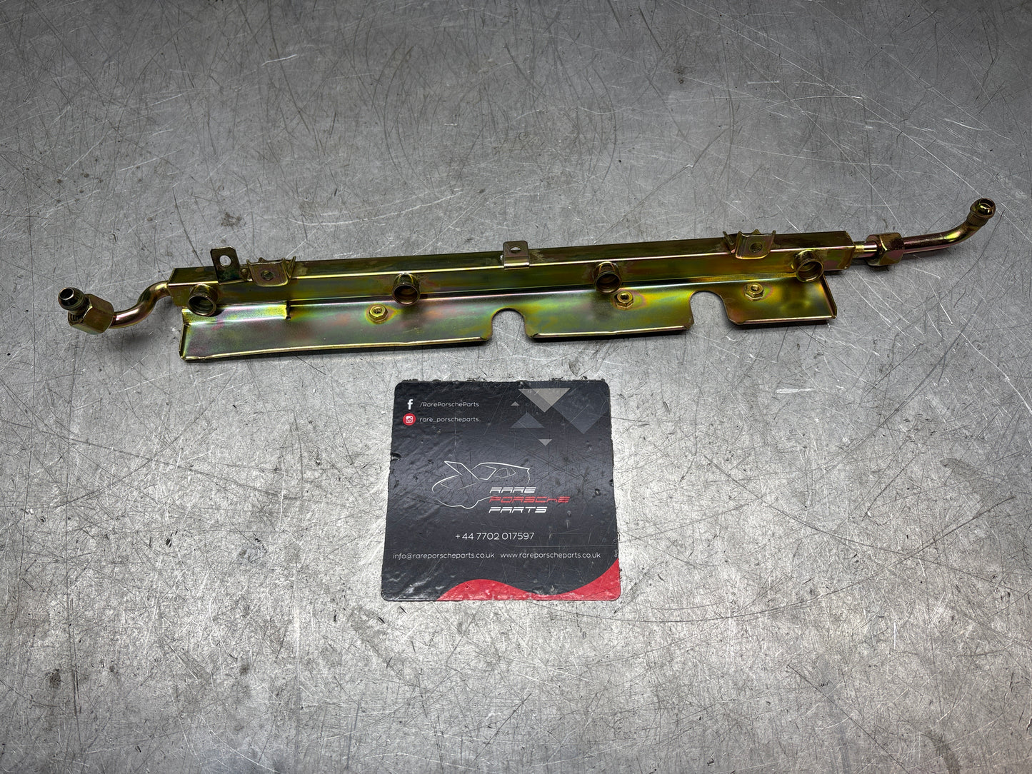 Porsche 928 S fuel rail, left, refurbished 92811007911