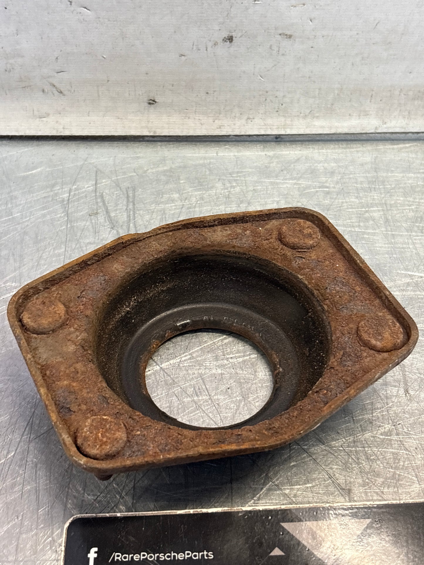 Porsche 924 / 944 front suspension bearing flange, 477412345, used