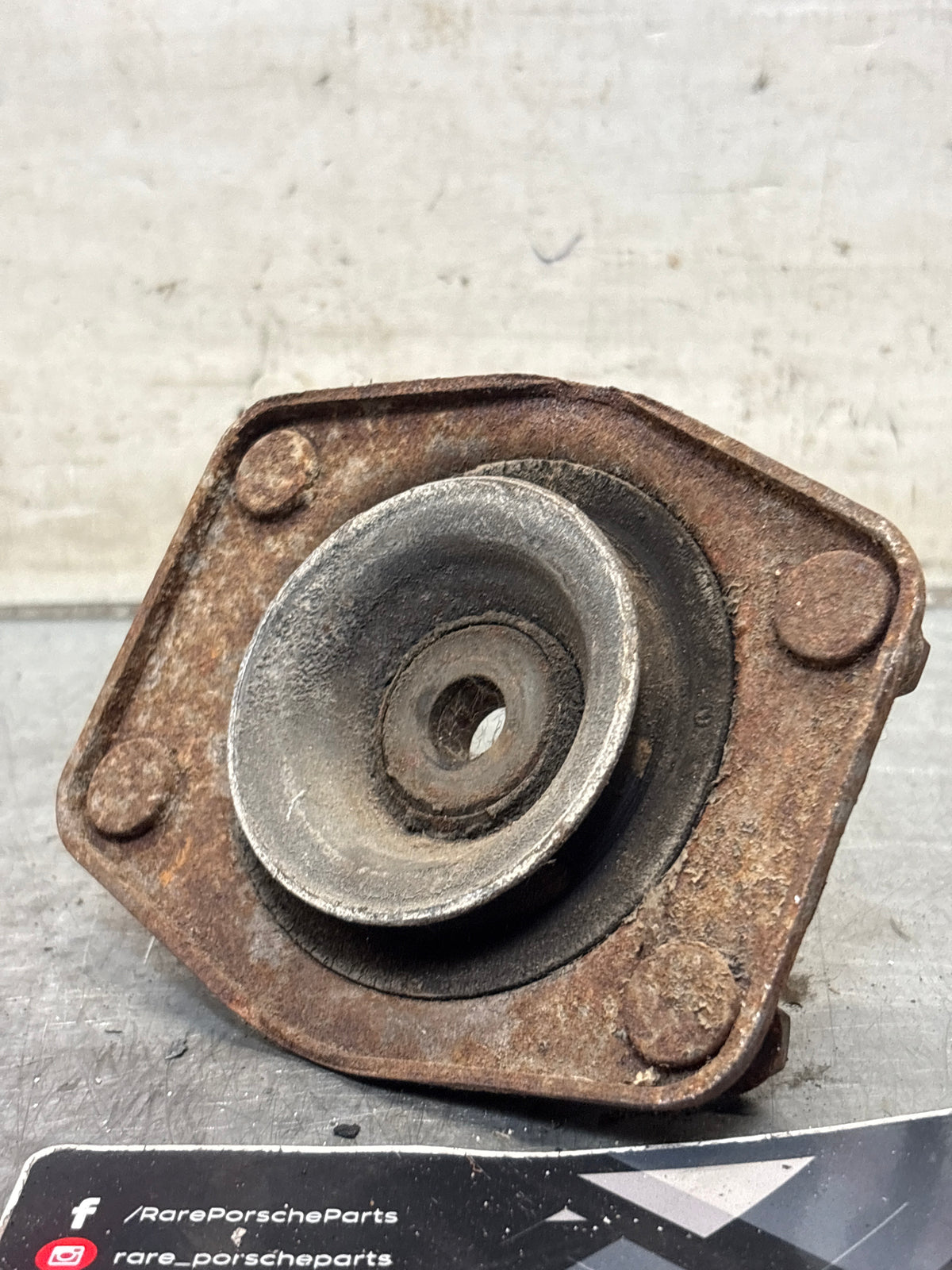 Porsche 924 / 944 front suspension bearing flange, 477412345, used