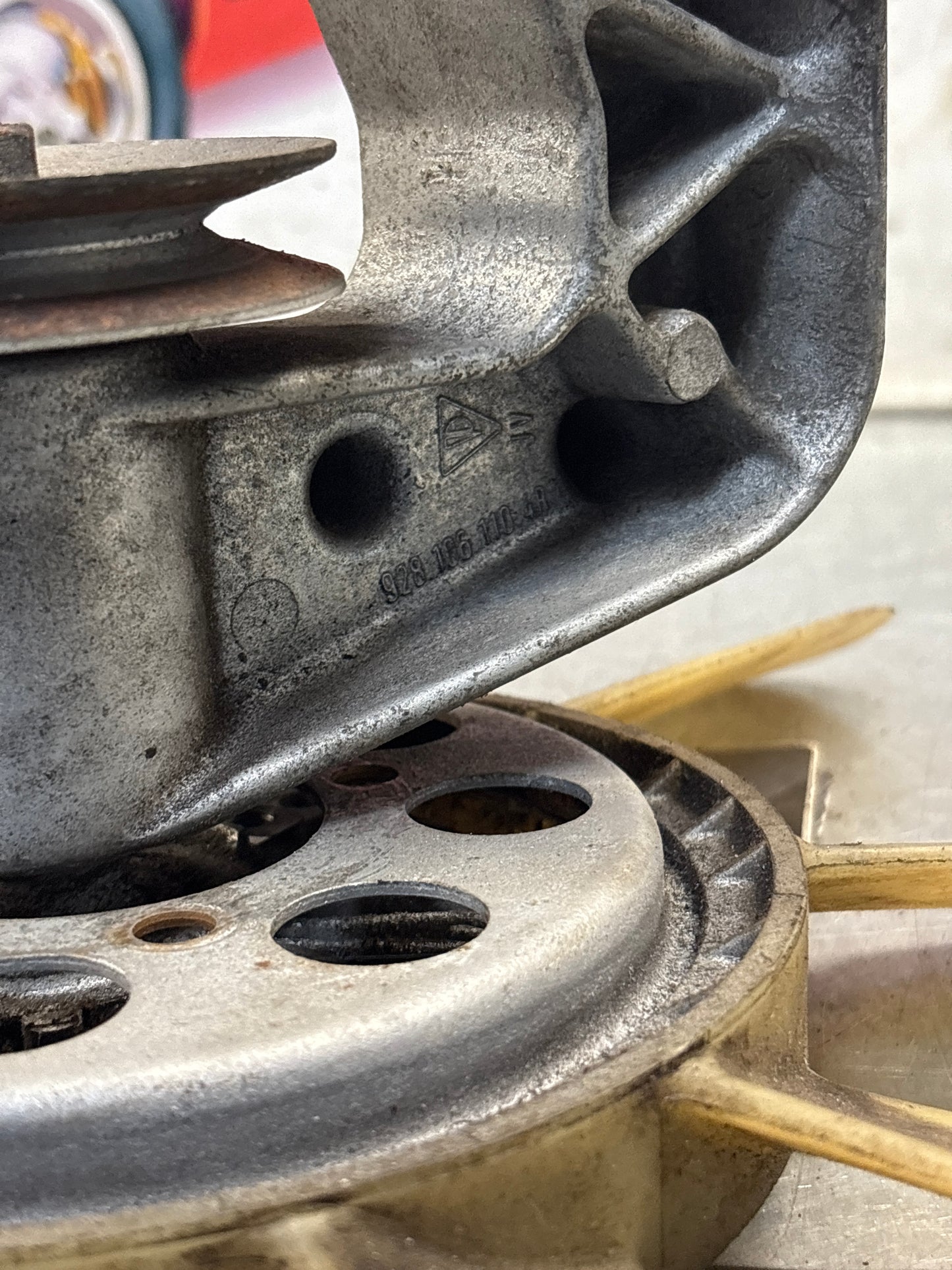 Porsche 928 late engine cooling fan clutch with bracket, used 92810611205 / 92810613701 / 9281061104R