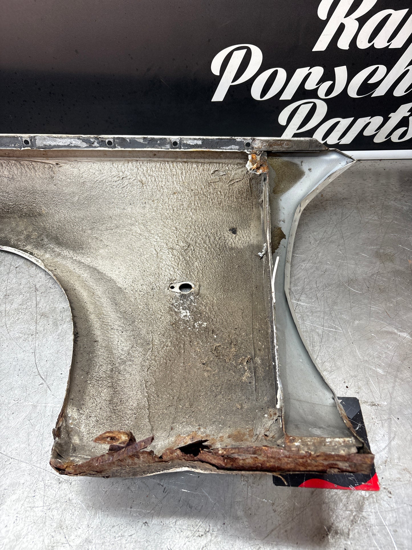 Porsche 944, early front right wing, in need of repair