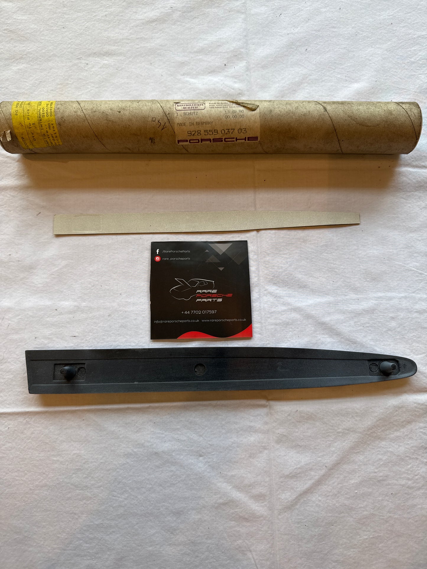 Porsche 928 left side front wing moulding trim 92855903703 NOS