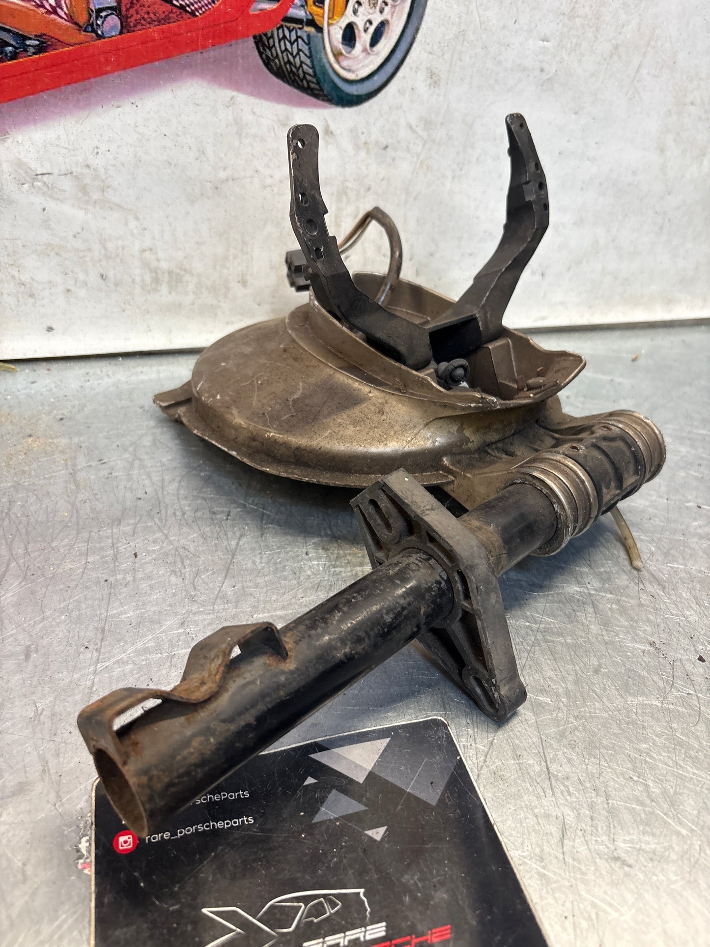 Porsche 928 right headlight swivel frame 92875024902 92875024302 used