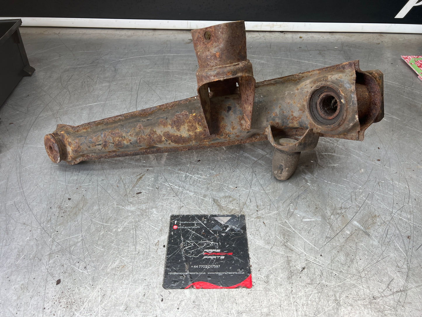 Porsche 924 944 -85.5 Rear left trailing arm, 94433102100