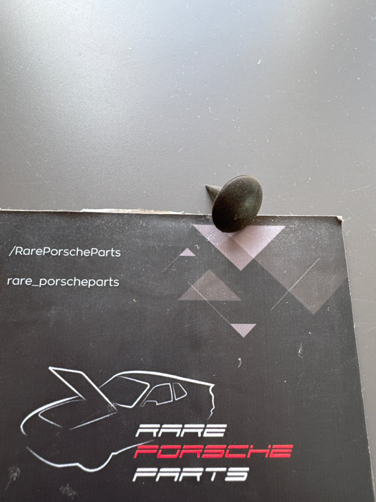 Porsche 924 / 944 pointy plug behind top of the front tower