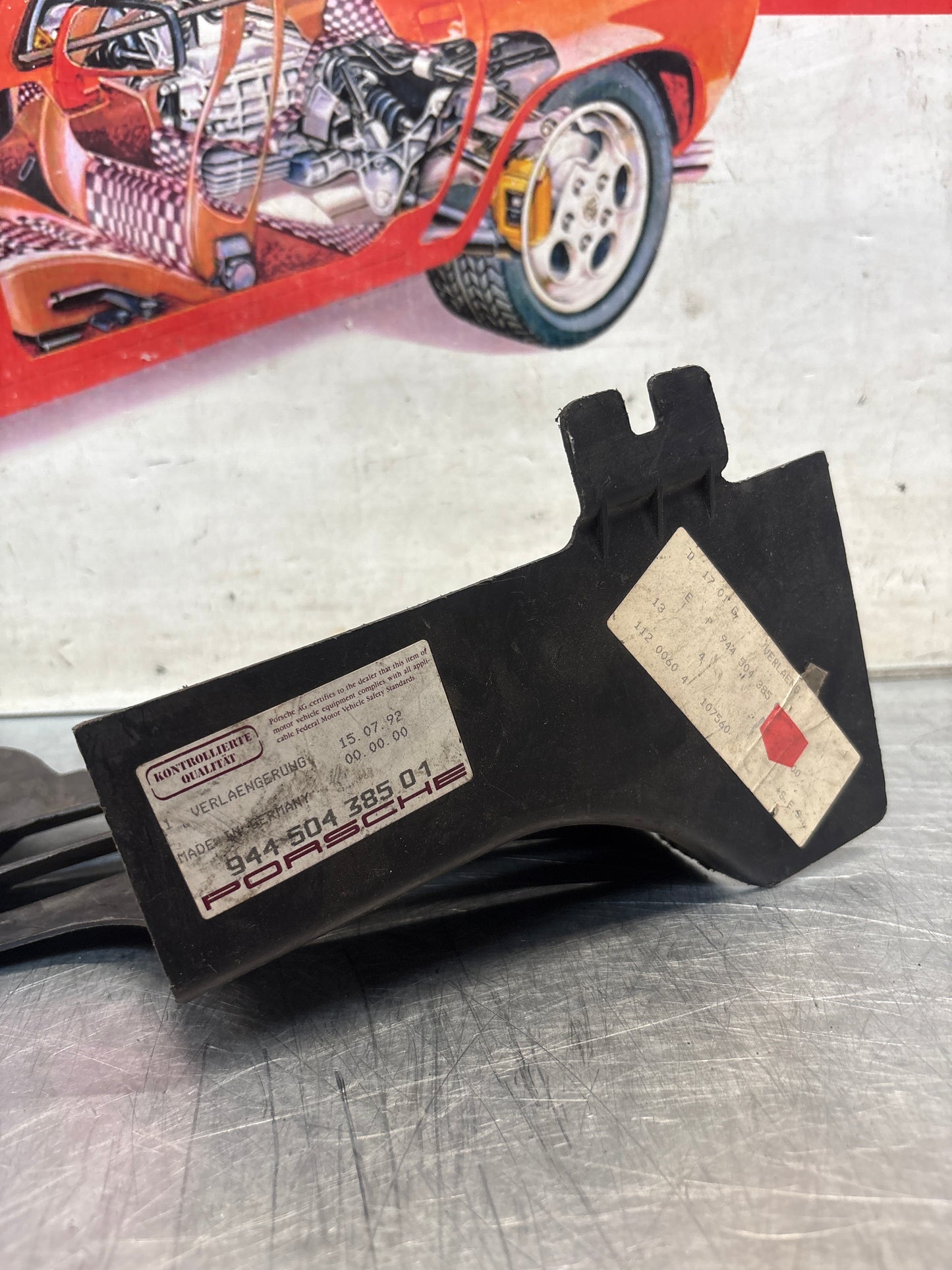 Porsche 968 left front wheel housing extension, genuine 94450438501