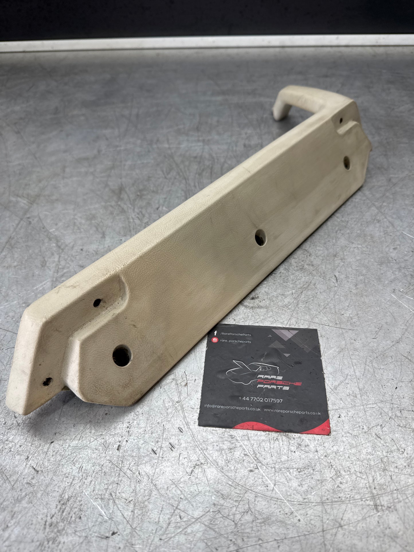 Porsche 944 left door pull handle armrest, white 477867171 used
