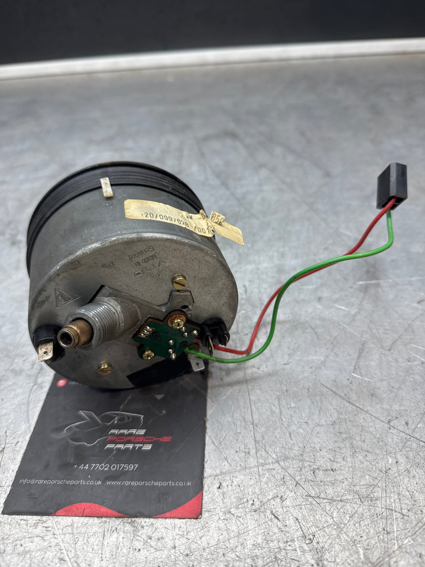 Porsche 944 speedometer showing 87917 miles 94464103600 used