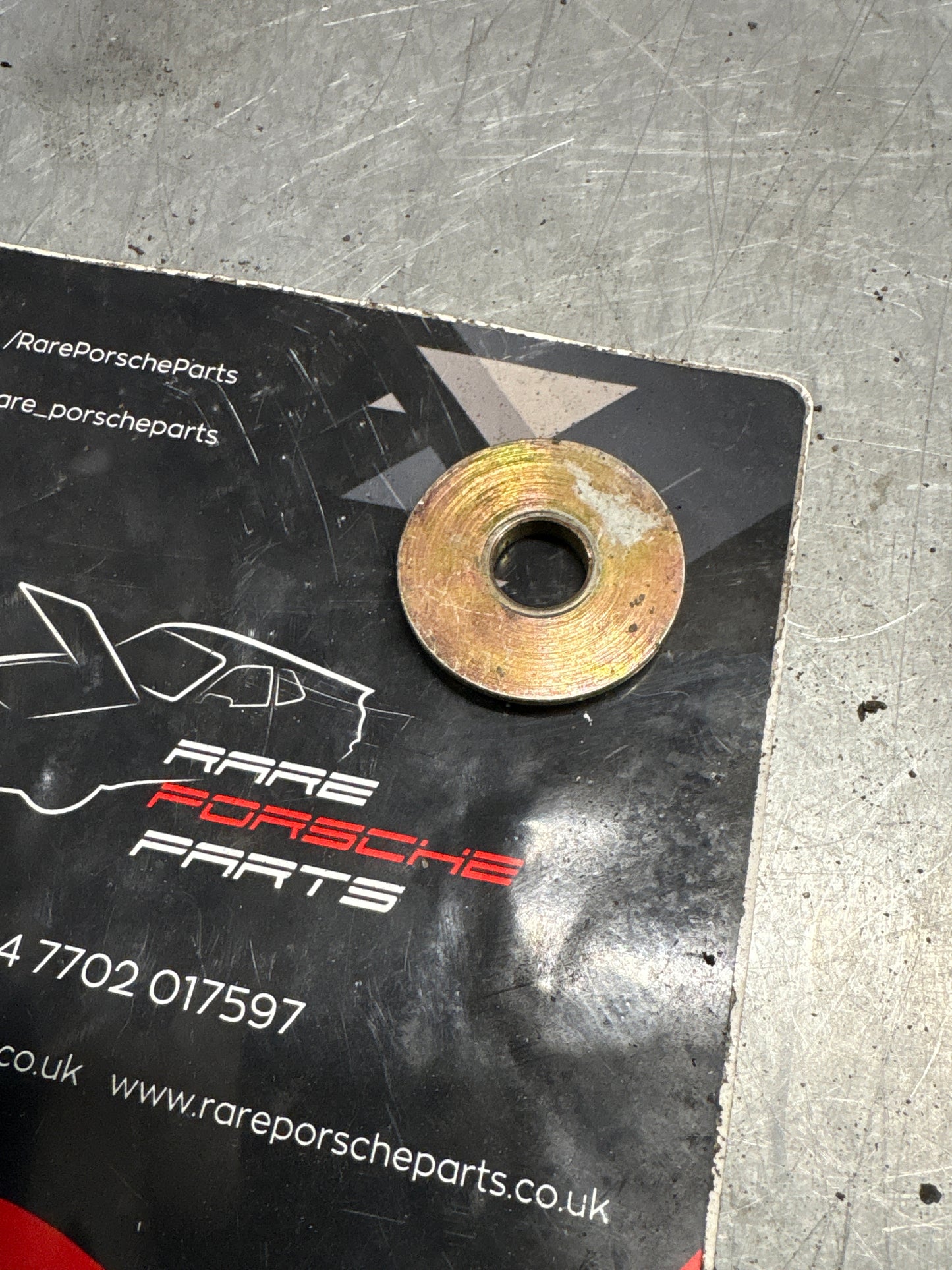 Porsche 928 rear shock absorber retaining plate, used