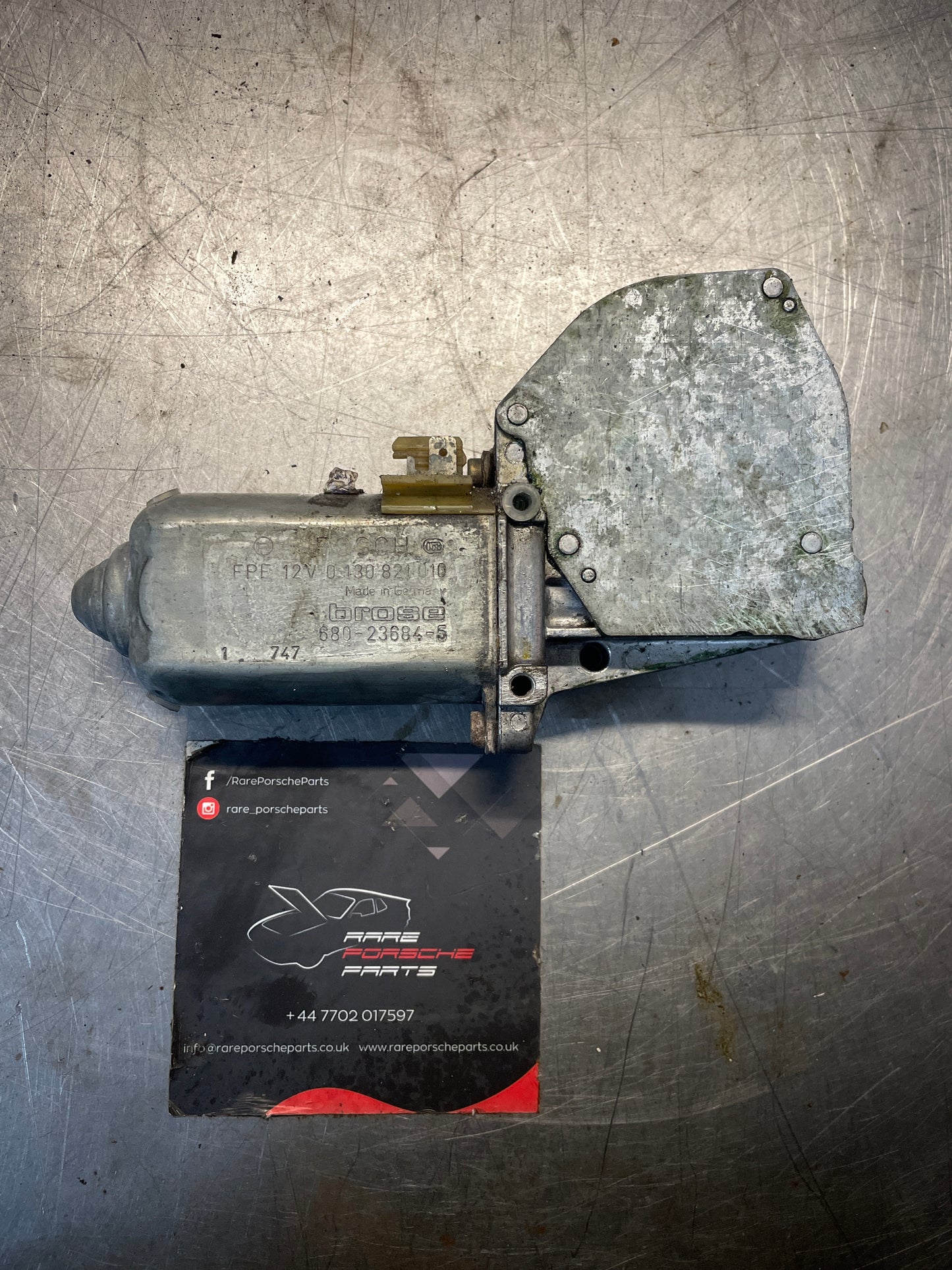 Porsche 928 left window motor, used 0130821010