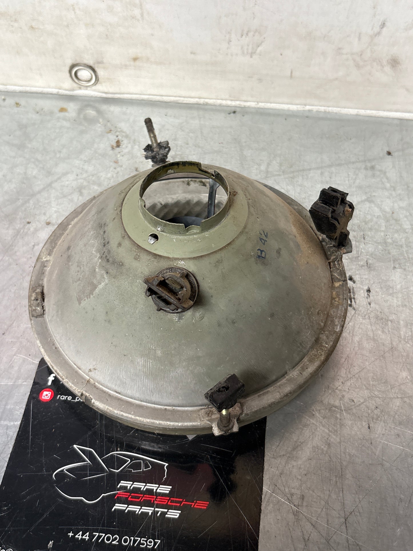 Porsche 924 944 Hella h4 headlight, LHD used 477941771 7R0114551 / 0234495 / 0214551