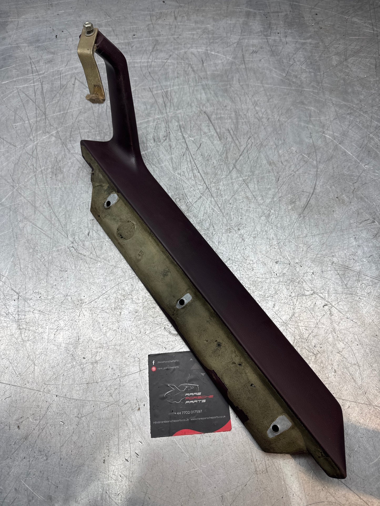 Porsche 944 left door pull handle armrest, burgundy 477867171 used