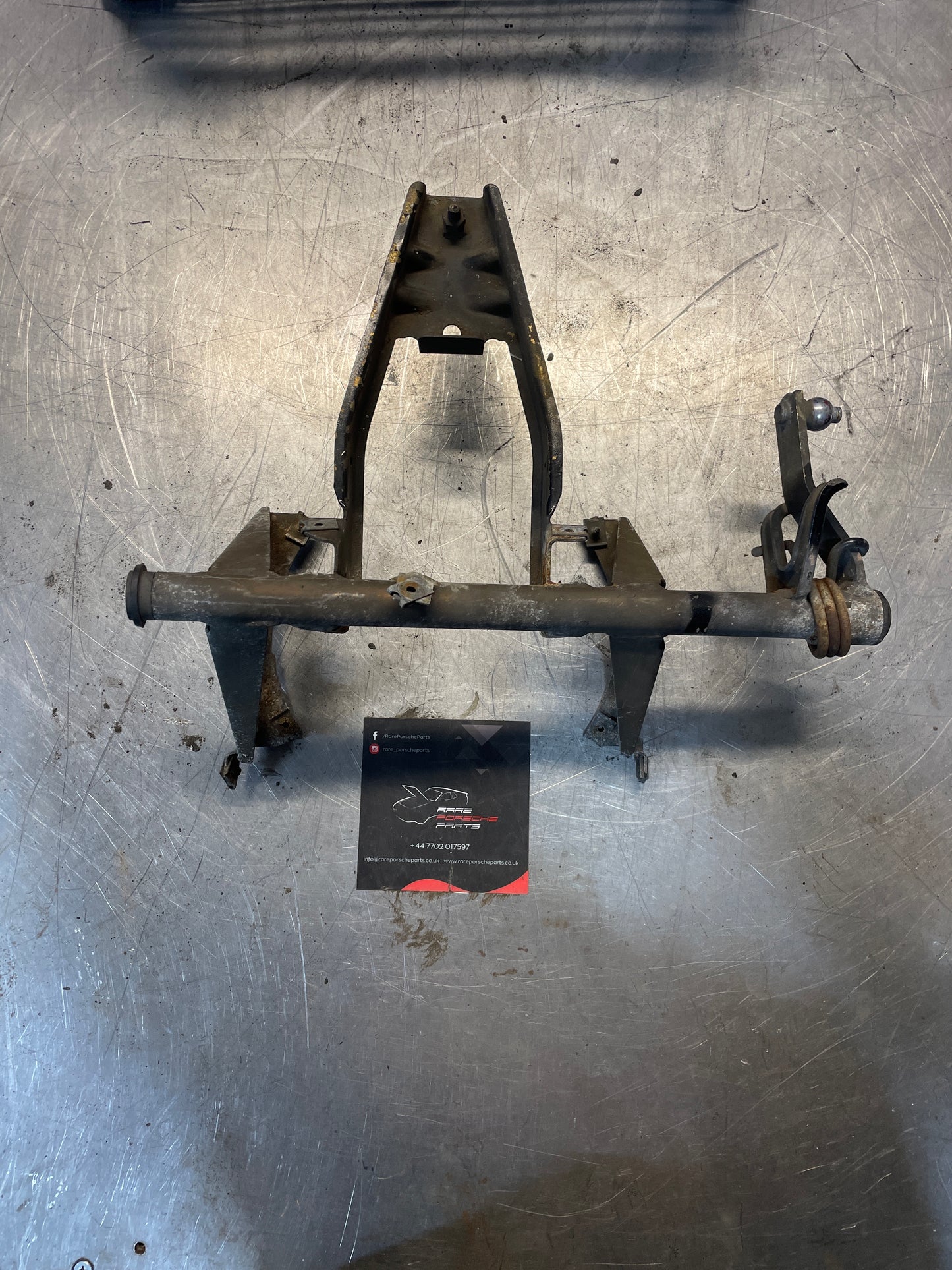 Porsche 924 944 left, near side headlight swivel frame, bracket 94475060500, used