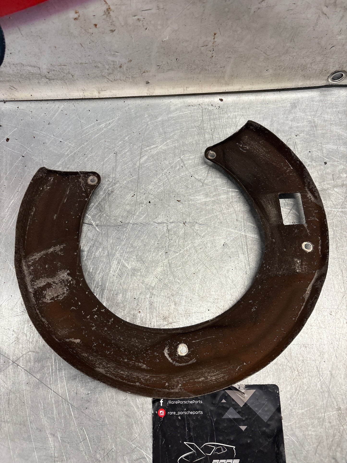 Porsche 928 S4 rear left brake dust cover plate, used 92835281305