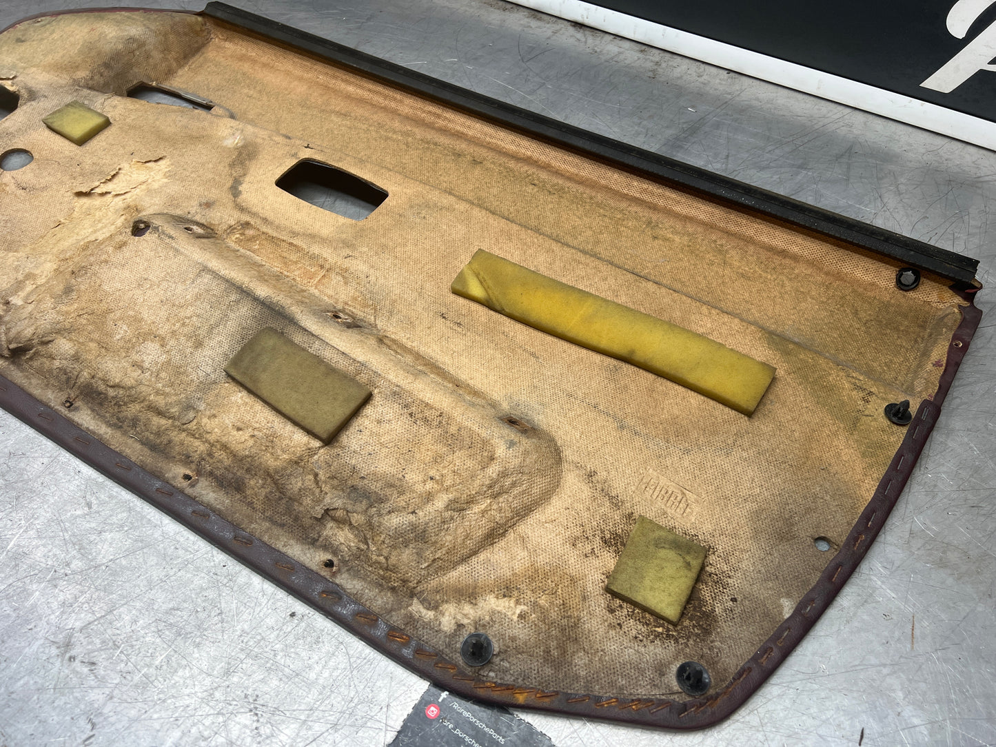 Porsche 944 left burgundy door card for late cars from 85.5 944555017