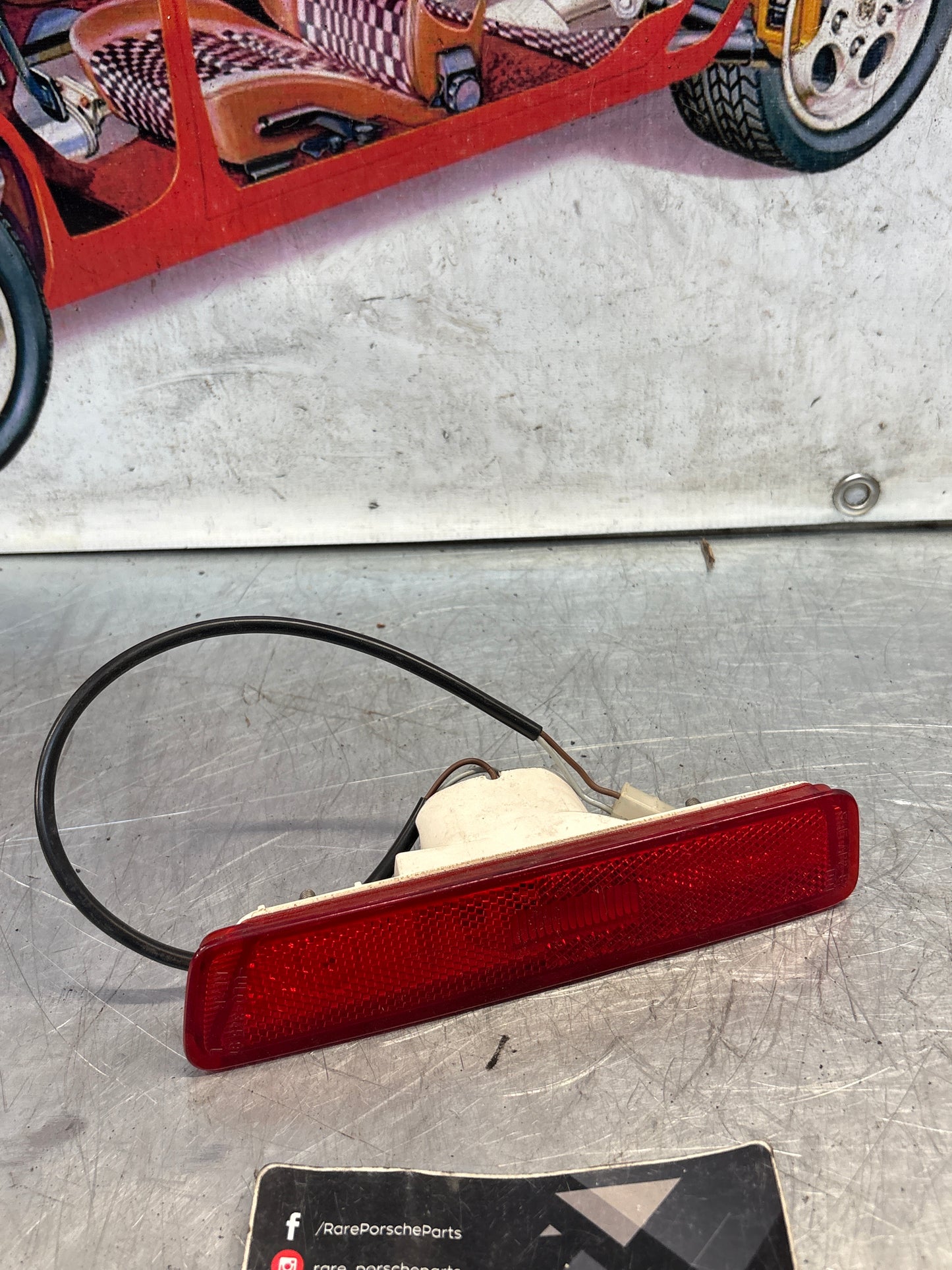 Porsche 944 rear bumper left side marker light, used 94463142500