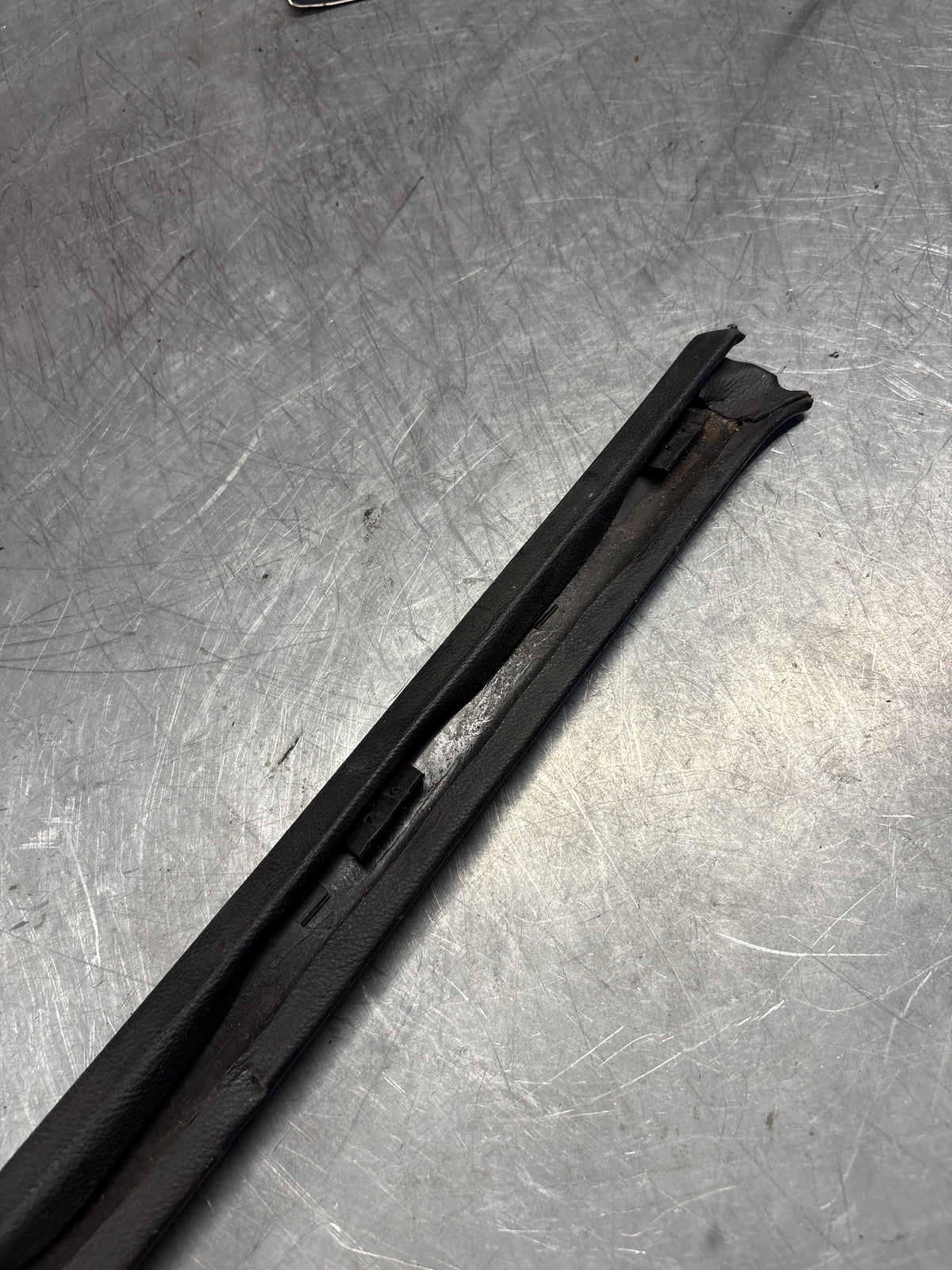 Porsche 928 tailgate trim, left, near side, black, 92855503702, used
