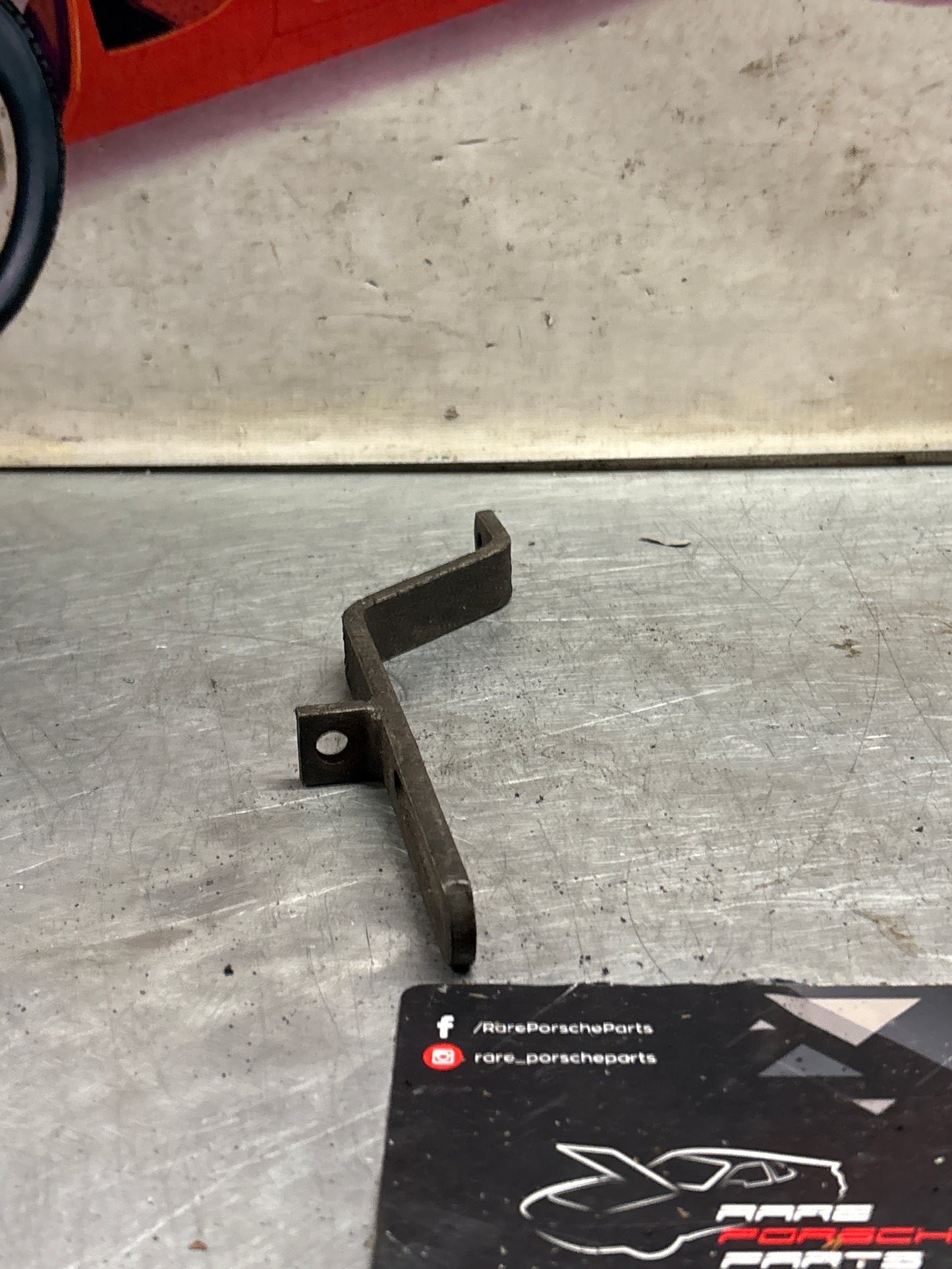 Porsche 928 air pump bracket 92811311310 / 99946000202, used