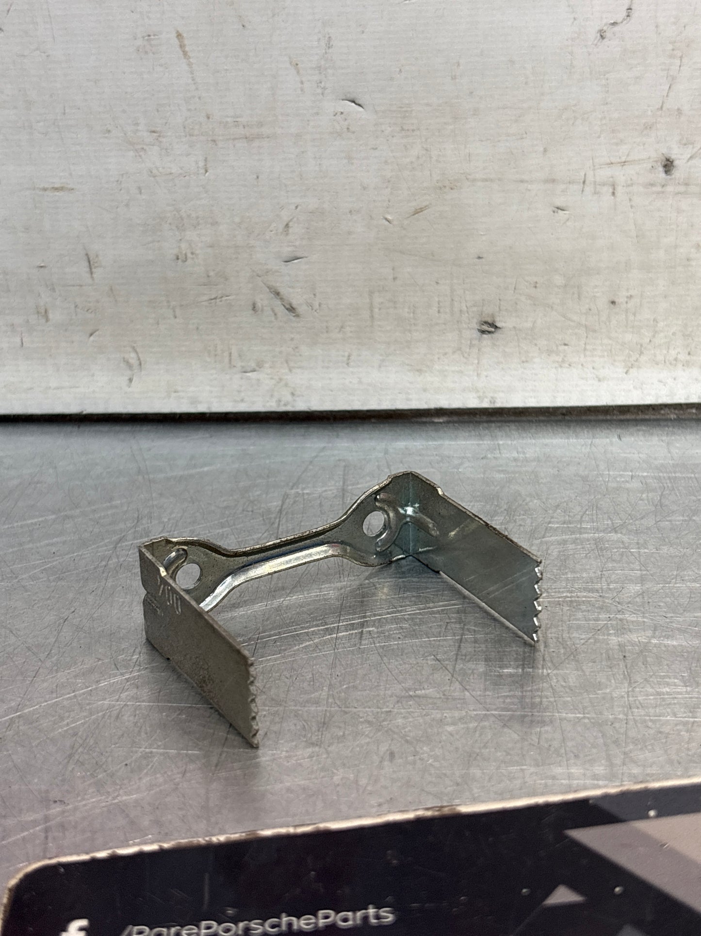 Porsche 924/944 instrument retaining bar, used 321919115C