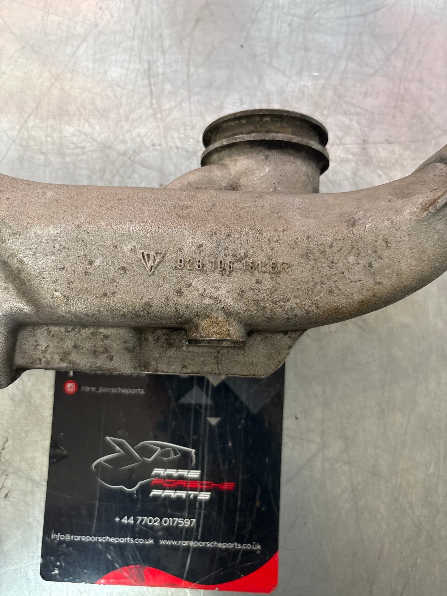 Porsche 928 thermostat housing, used 9281061616R