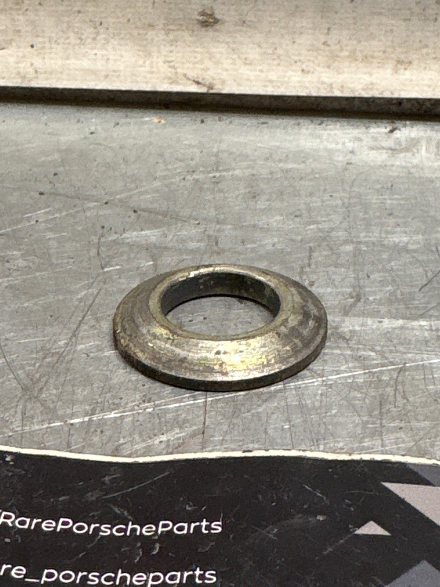 Porsche 928 wishbone bearing pin cone washer, used 92833165506