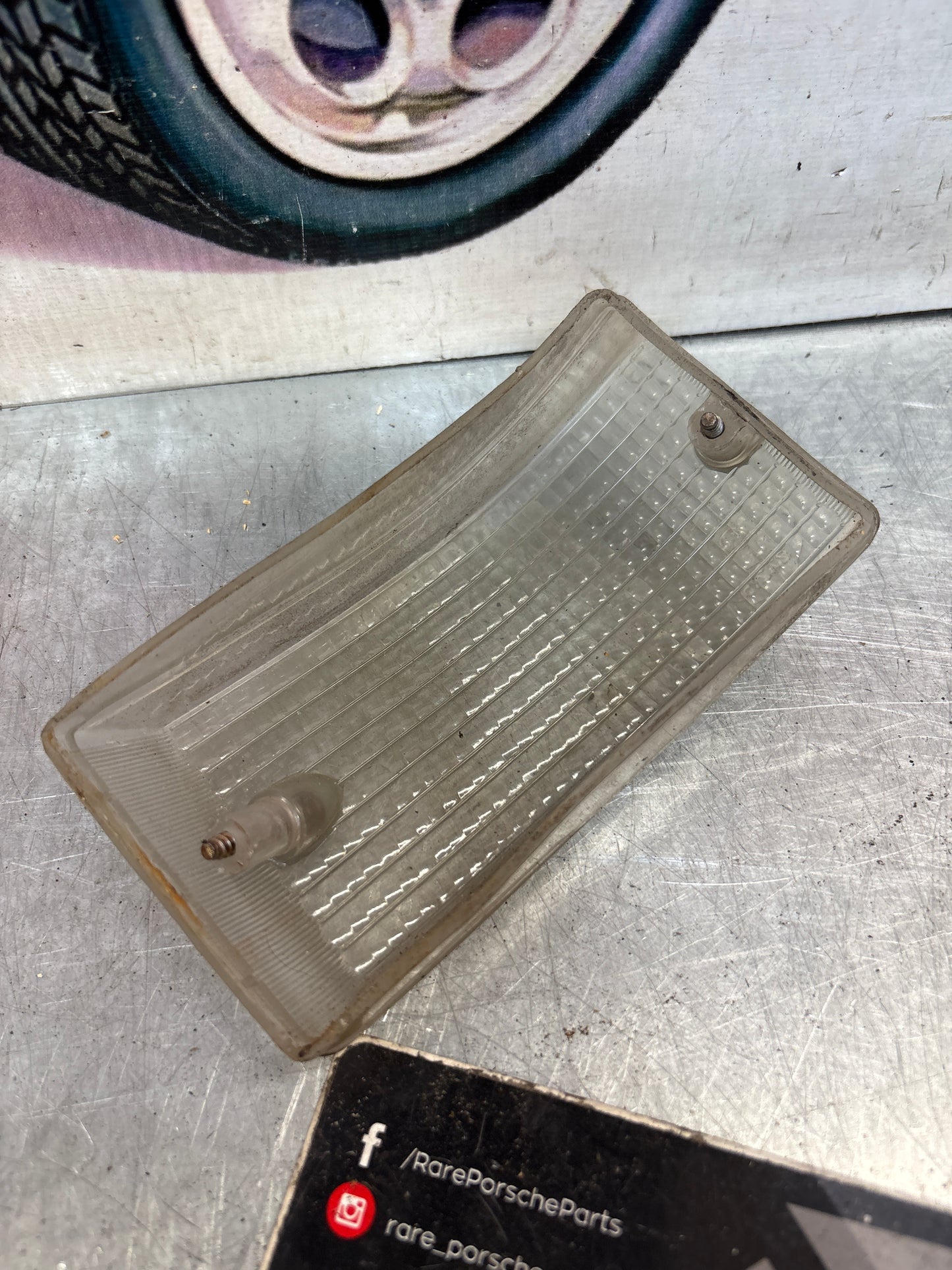 Porsche 924 944 left white turn signal indicator lens, front tinted, 477953161B smoked