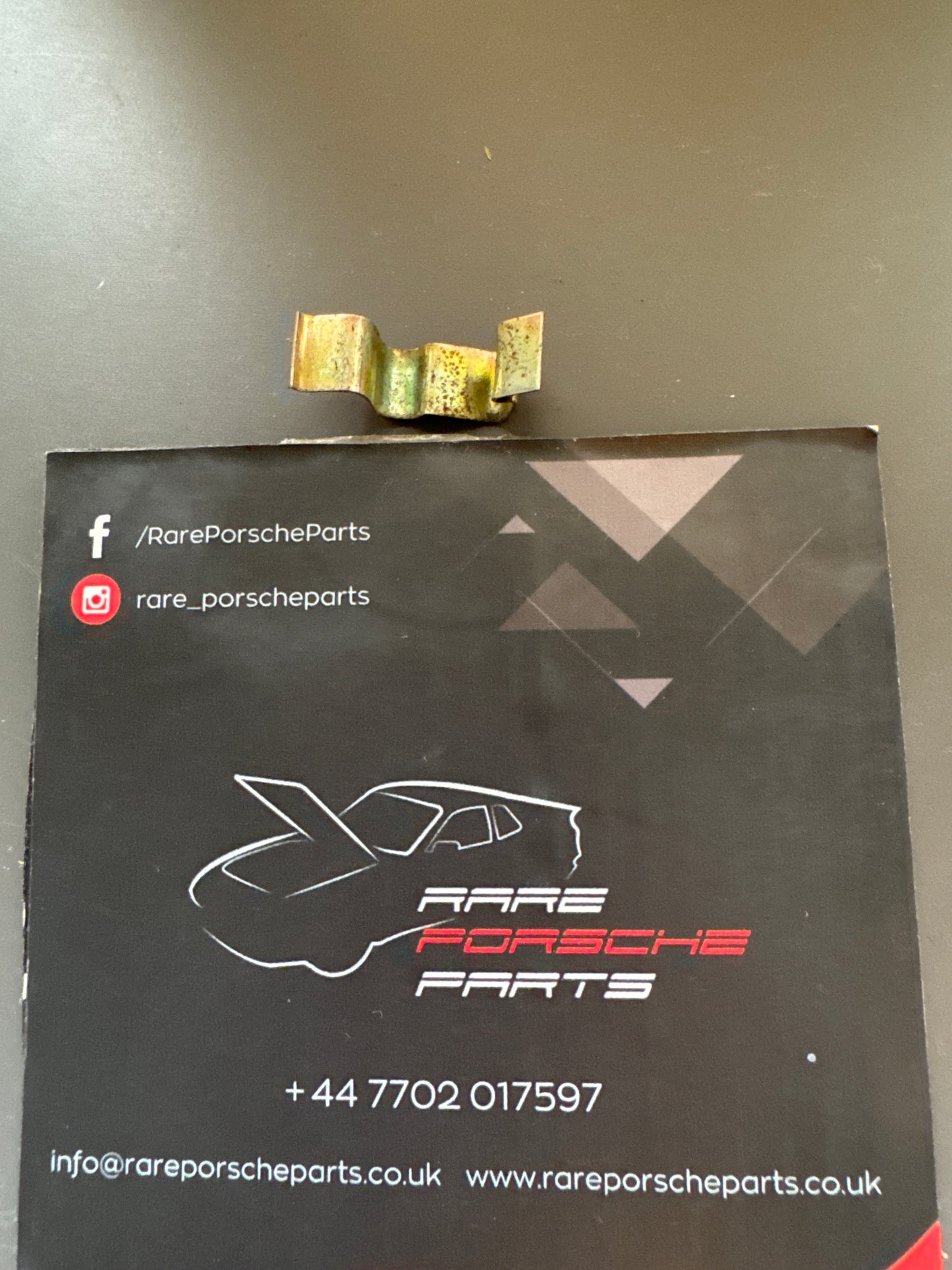 Porsche spring clip 477819343 used