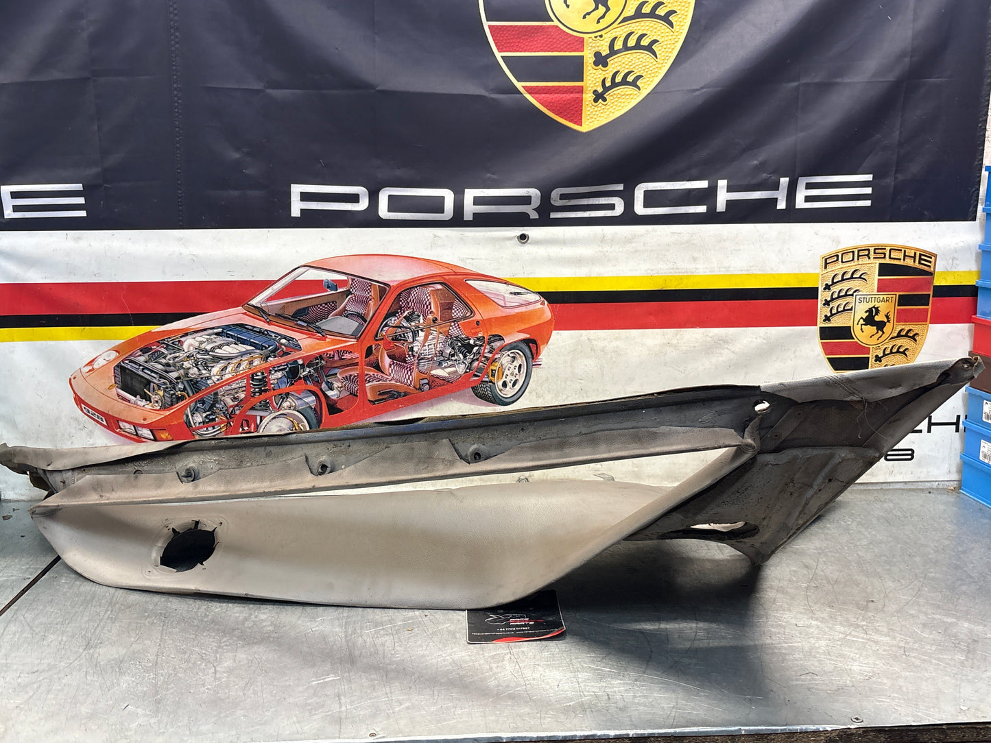 Porsche 928 right side lower side trim panel, grey used 92855502257